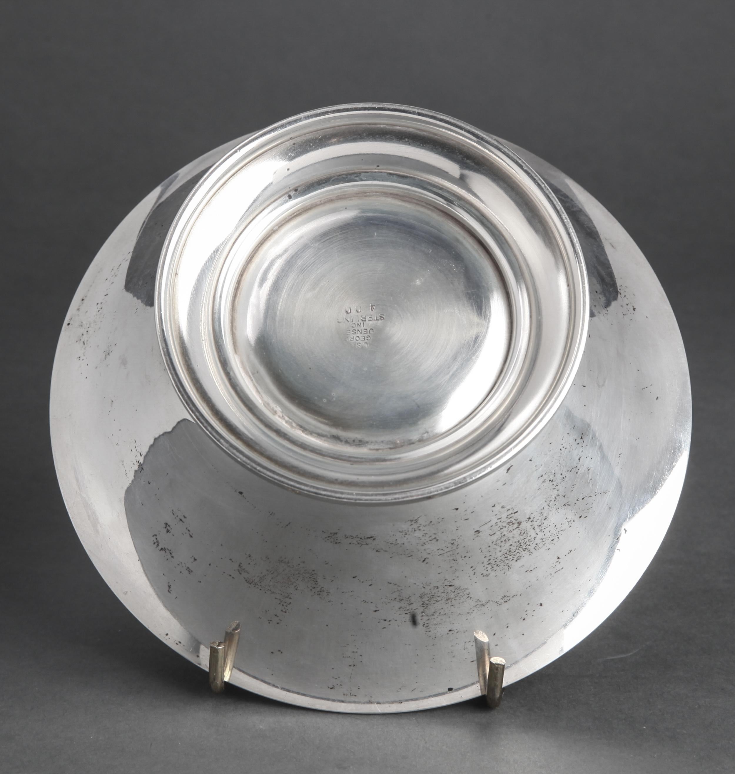 Modern sterling silver footed bowl with flared rim, made by Georg Jensen. The piece is marked on the bottom: 