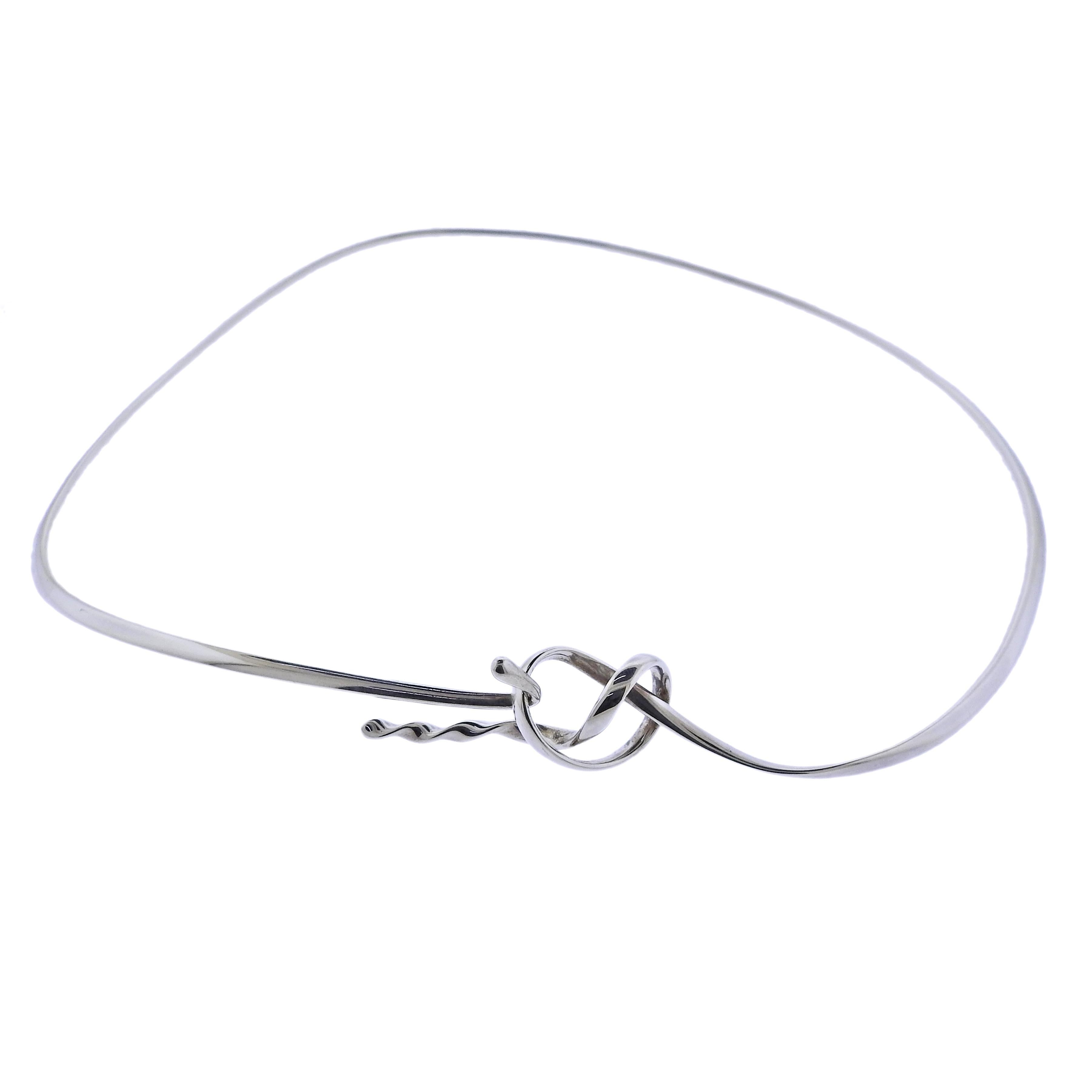 Brand new Georg Jensen sterling silver Forget Me Knot necklace. Necklace is approx. 16-16.5