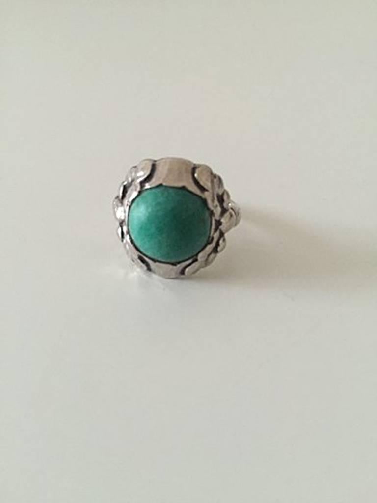 Georg Jensen Silver Ring with Green Agate No 11A. From 1933-1944 and is in good condition. Ring Size 56 / 7 1/2. Weighs 5.3 g / 0.19 oz.