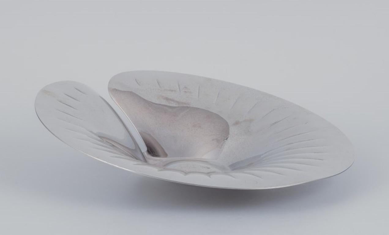Georg Jensen, ciotola in acciaio inossidabile.
Design modernista.
21° secolo.
Contrassegnato.
In ottime condizioni con lievi segni d'uso.
Dimensioni: D 31,0 cm x H 7,5 cm.