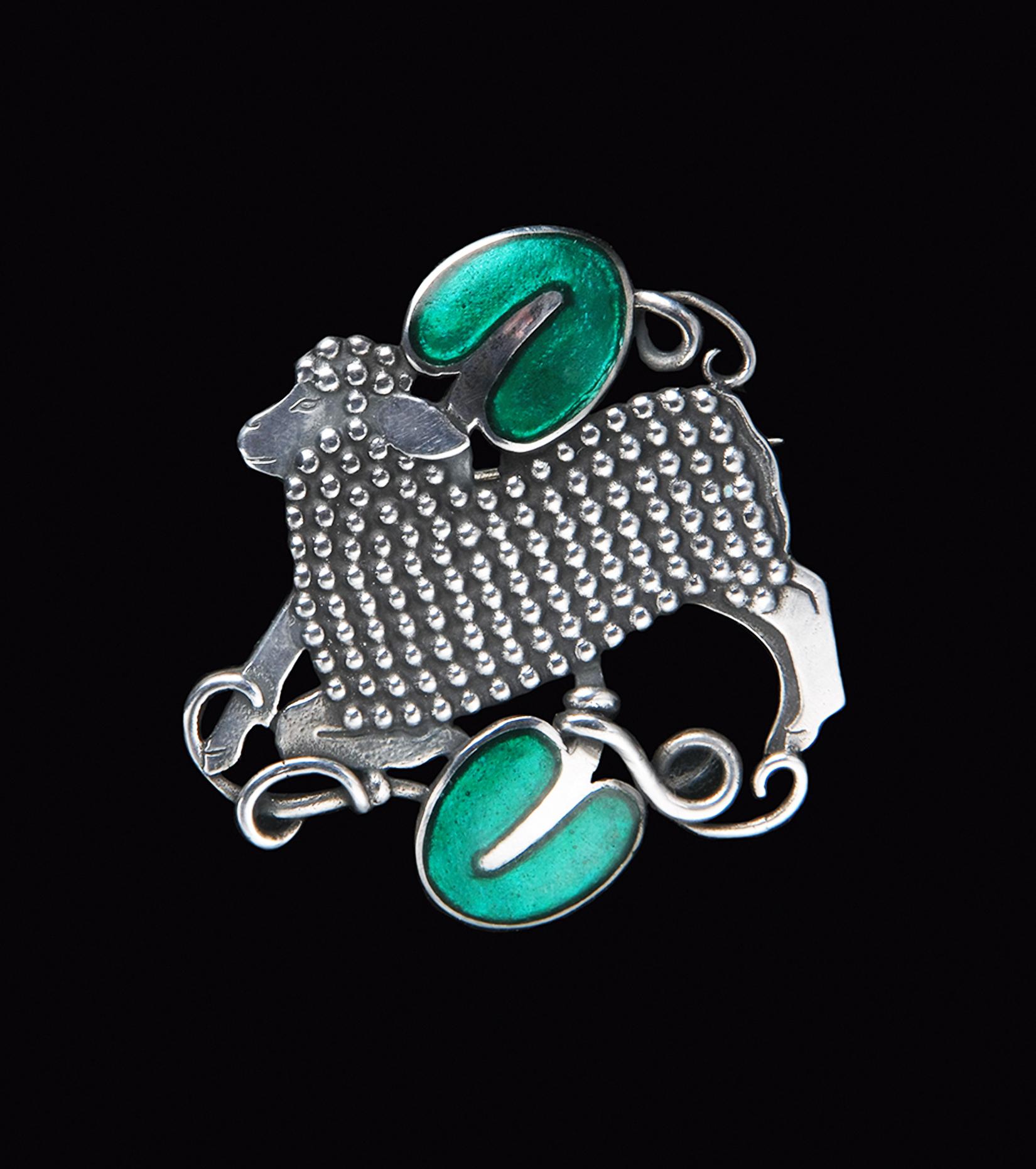 Rare Georg Jensen Arno Malinowski silver enamel lamb brooch, Denmark, circa 1942. The Brooch with realistic lamb and green enamel hearts, full vintage marks to reverse GJ 925 sterling Denmark and numbered 284. Dimensions: Approximately 1.25 x 1.25