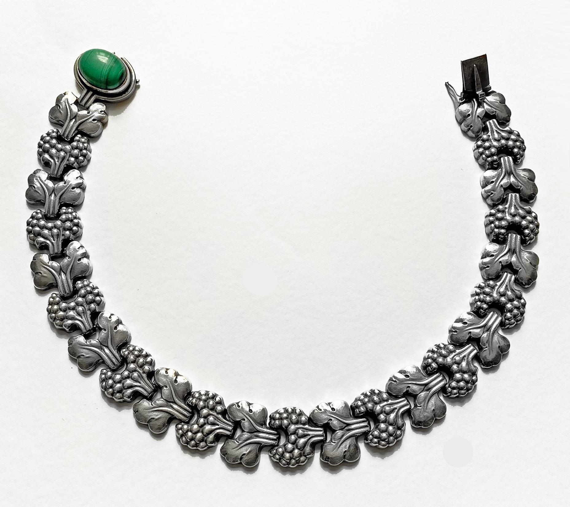 An extremely Rare Georg Jensen Sterling Silver PARIS Necklace No 30, Denmark C.1945. Set with a large oval cabochon Malachite stone. A similar example bracelet with amber is featured in Drucker reference Georg Jensen , A Tradition of Splendid