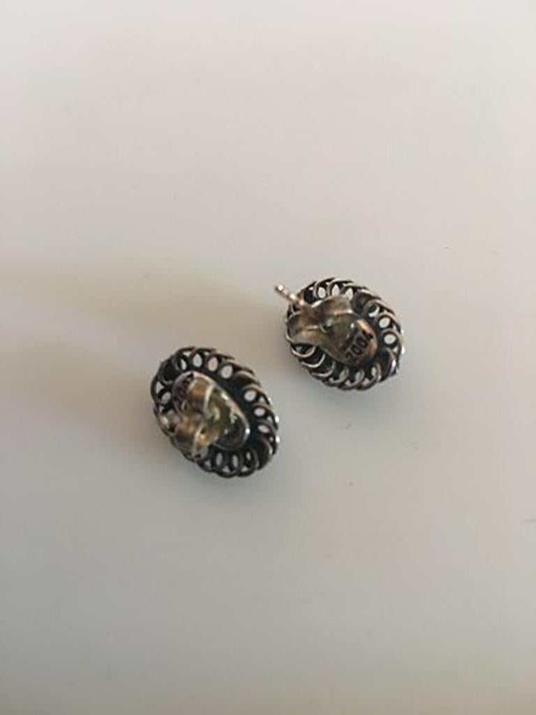 Georg Jensen Sterling Silver 2004 Annual Earrings with Black Onyx (Stickers). Measures 1.5 cm / 0 19/32 in. dia. Weighs 3.8 g / 0.13 oz.