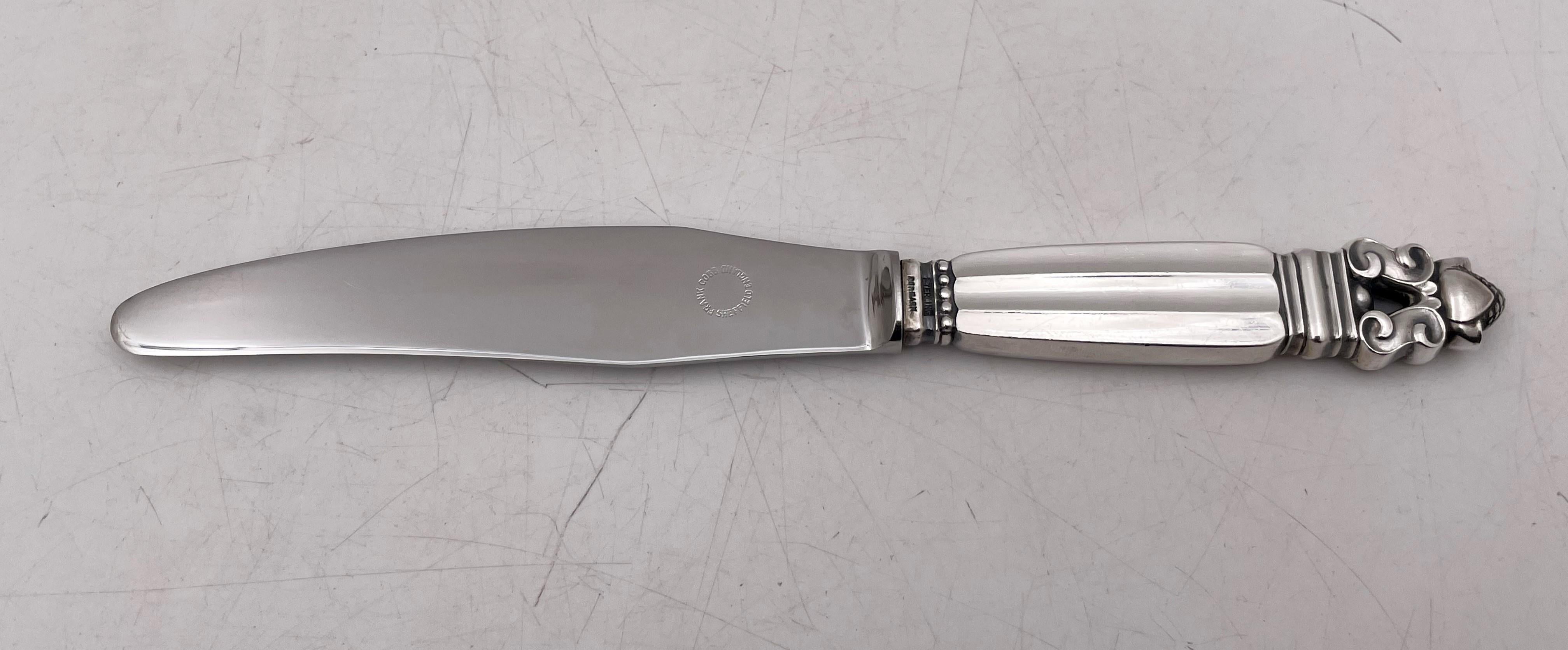 Georg Jensen, sterling silver place setting in the celebrated Acorn pattern, designed by Johan Rohde, consisting of:

- a Texan dinner knife measuring 9 7/8'' in length

- a dinner knife measuring 9 1/8'' in length

- a luncheon knife measuring 8
