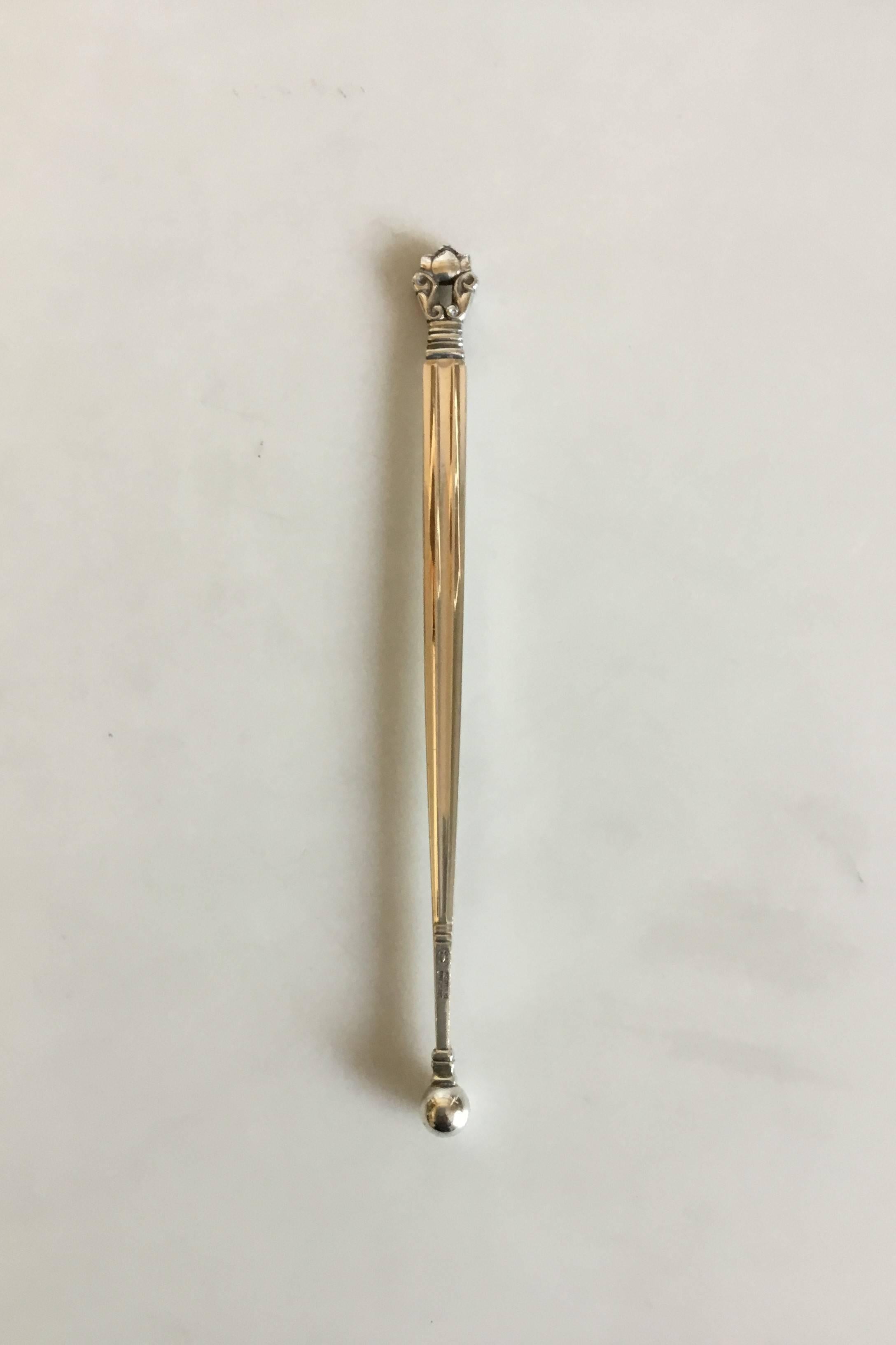 Georg Jensen sterling silver acorn drink stick.
Measures: 14.9 cm / 5 55/64 in.