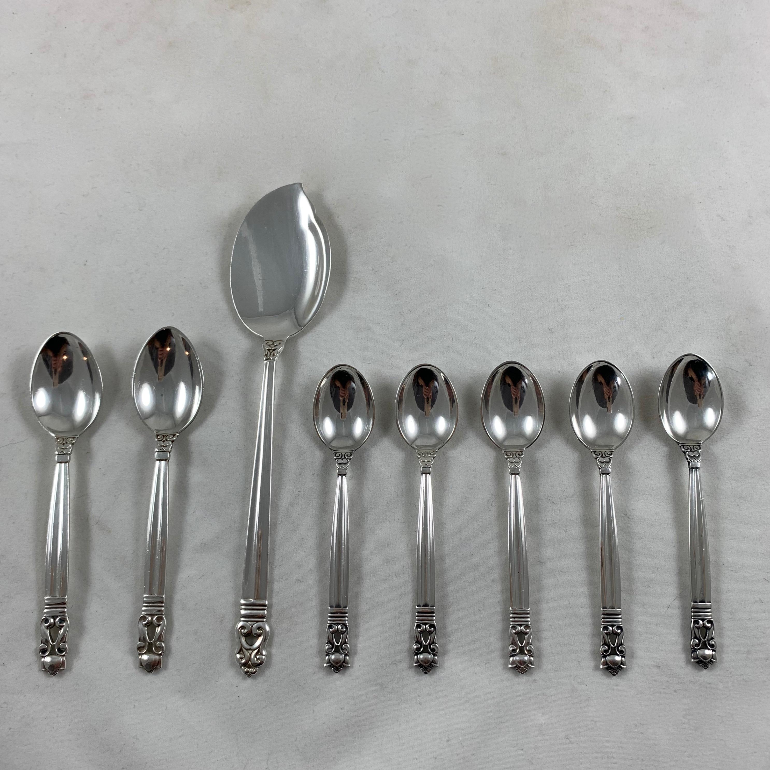 An assembled sterling silver breakfast service, consisting of a pastry server, two jam spoons and five mocha spoons - a set of eight in the Classic acorn pattern.

Measure: One pasty server 6.5 in. L x 1 3/8 W
Five mocha spoons 3.75 in. L x .75
