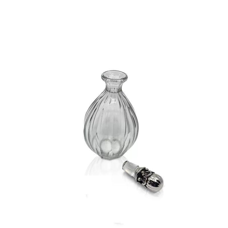Georg Jensen Decantador de plata de ley y cristal 100 Martillado