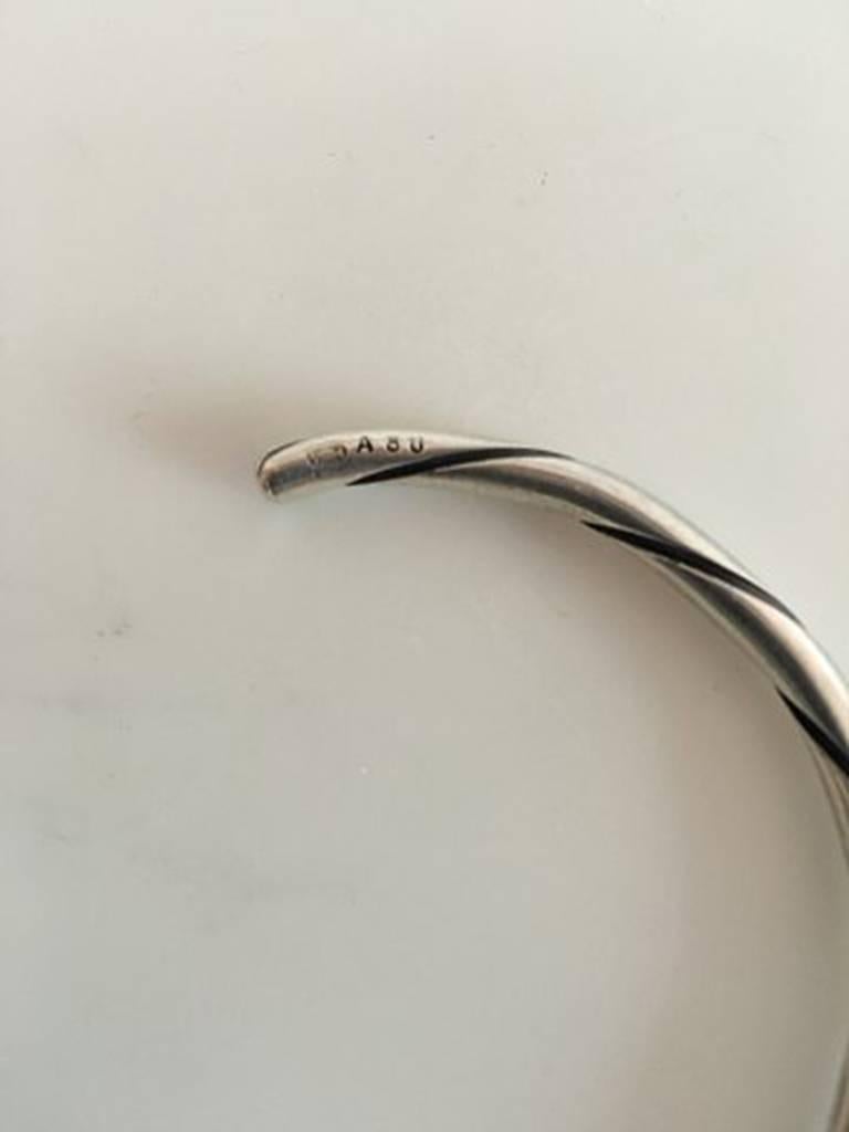 Georg Jensen Sterling Silver Arm ring #80A. The opening measures 3 cm / 1 3/16 in. Weighs 18 g / 0.65 oz.