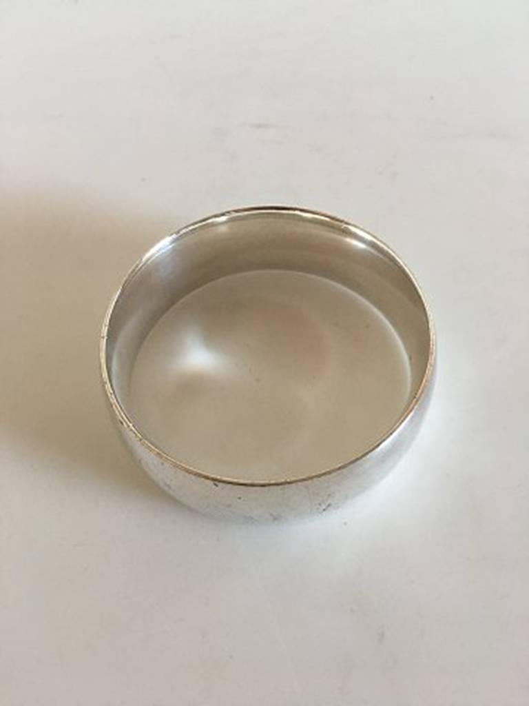 Georg Jensen Sterling Silver Arm ring/Bracelet #1145. Measures: Inner Diameter 6.3 cm / 2 31/64 in., Width 2.3 cm / 0 29/32 in.. Weighs 71 g / 2.50 oz.
