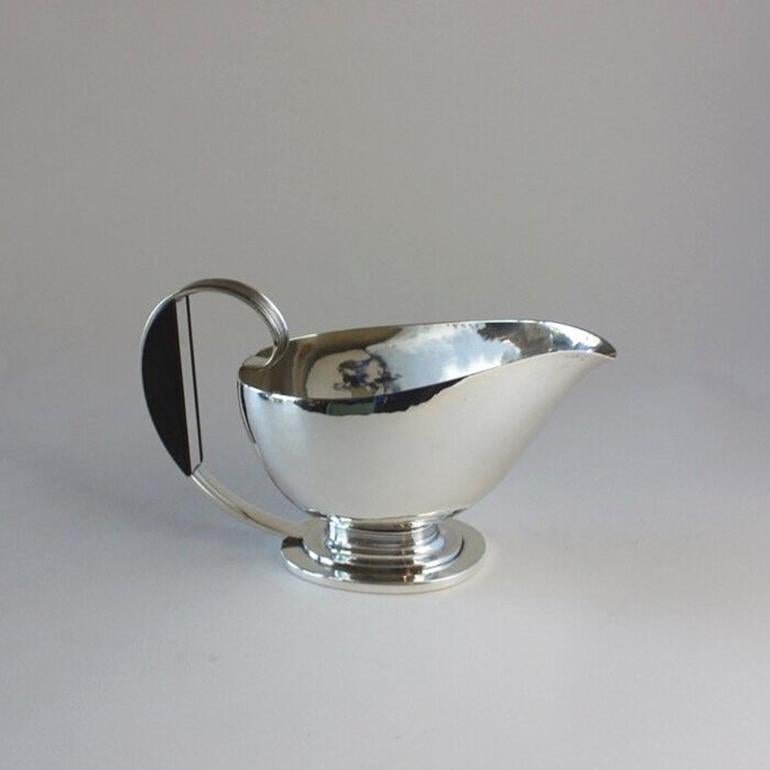 Danish Georg Jensen Sterling Silver Art Deco Sauce Boat with Ebony Handle, No.766 by Gu For Sale