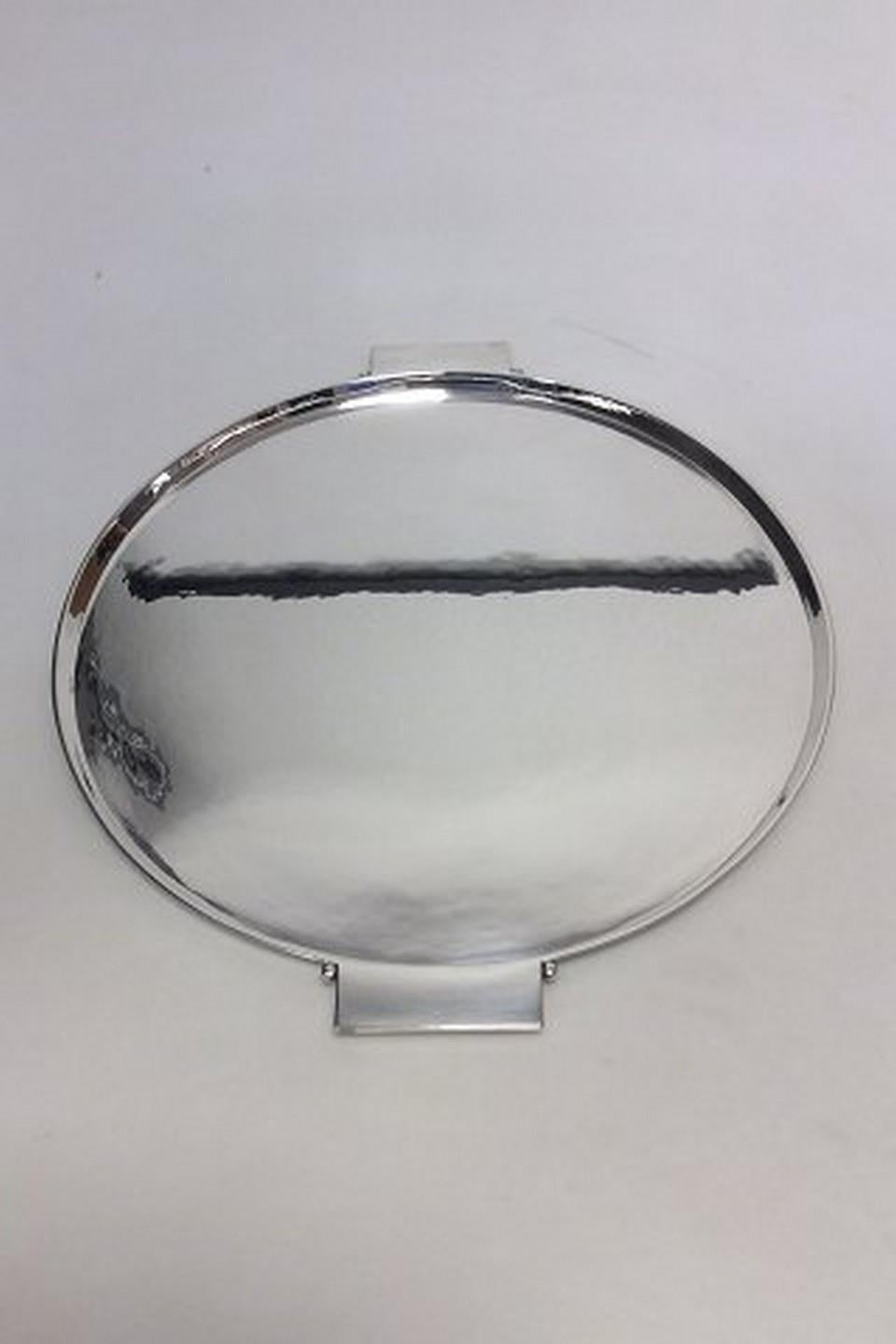 Georg Jensen sterling silver Art Deco tray by Johan Rohde no 529 A

Measures 43.2cm with handles and 38.5cm without (17