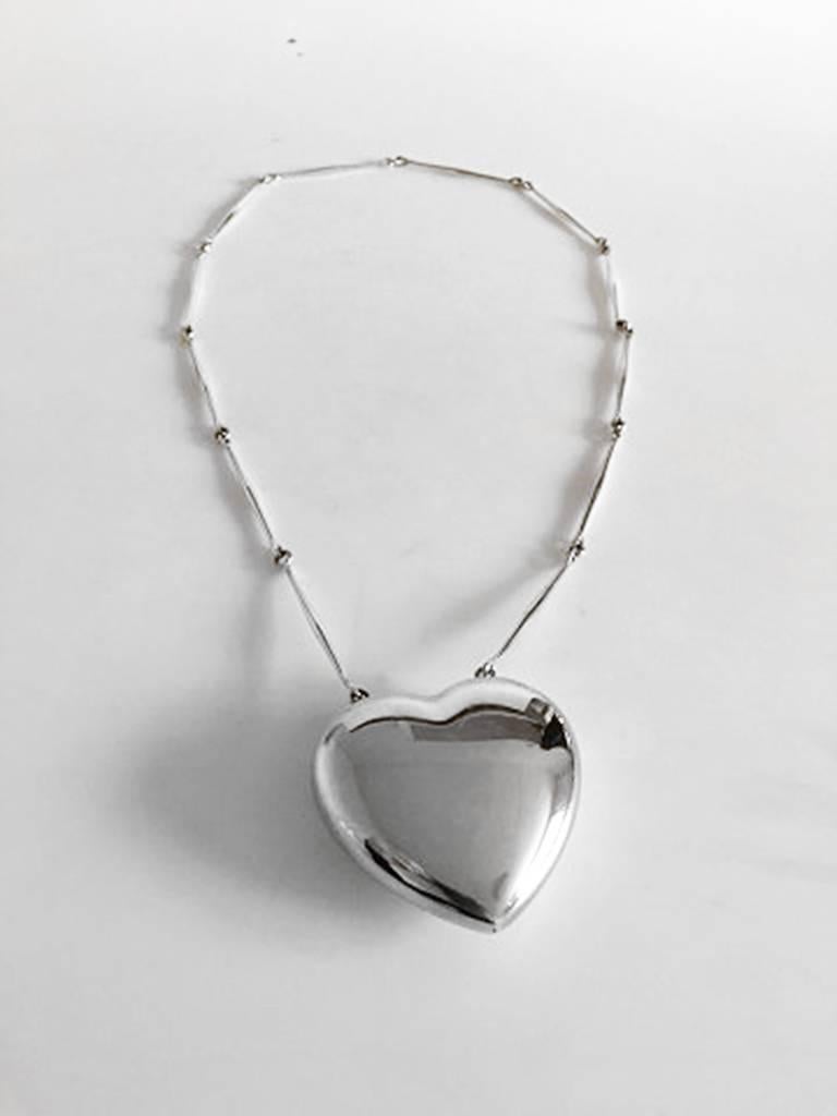 Georg Jensen Sterling Silver Astrid Fog Necklace with Large Heart Pendant No 126. Measures: Chain 80 cm / 31 1/2 in. The pendant is 6.5 cm x 6.5 cm / 2 9/16 in. x 2 9/16 in. Weighs 117 g / 4.60 oz. In good condition