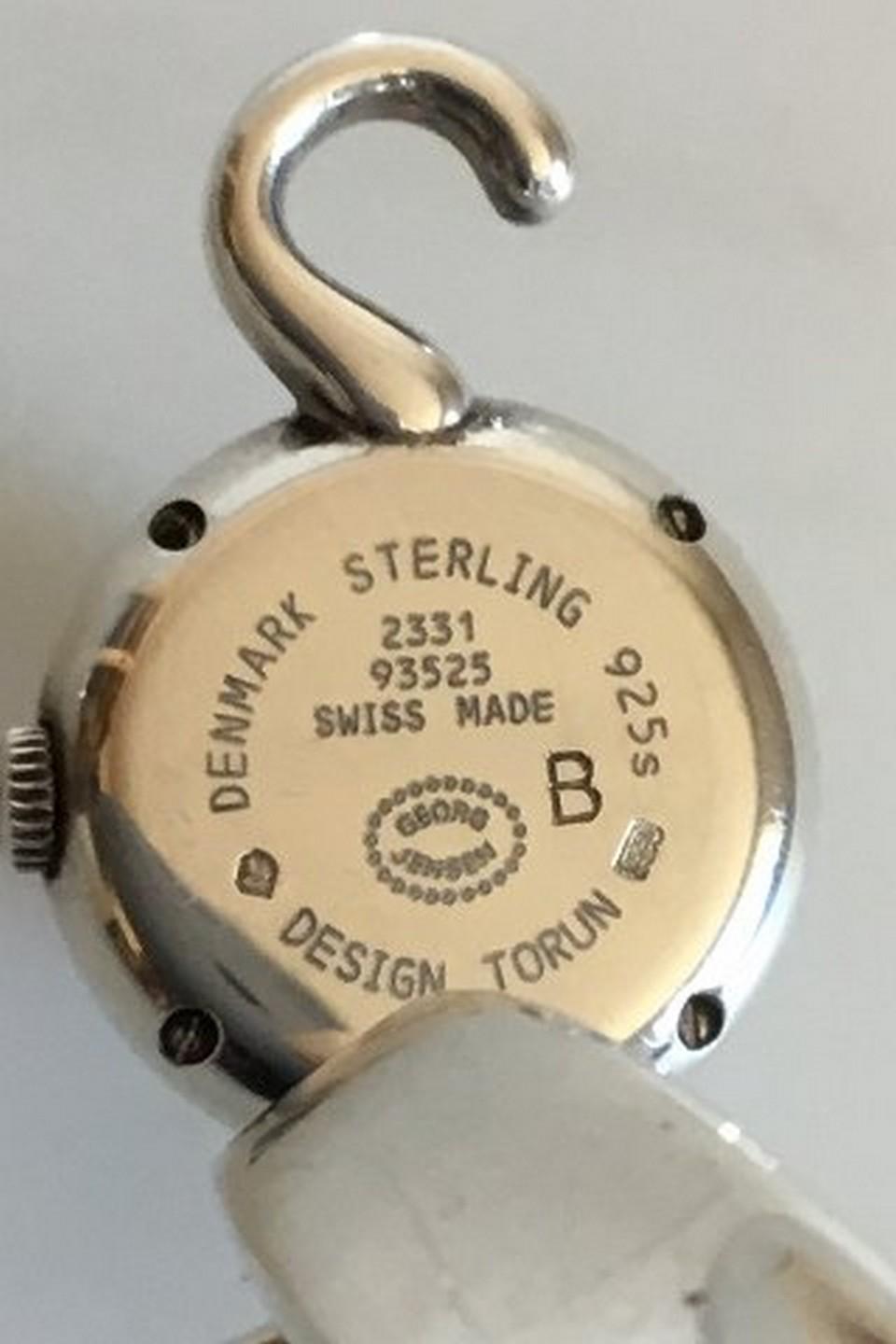 Georg Jensen Sterling Silver Bangle Watch with Rock Crystal Face No 231. Designed by Vivianna Torun Bülow-Bübe in original box. Measures 5.5 cm / 2 11/64 in dia. Weighs 46.2 g / 1.63 oz.