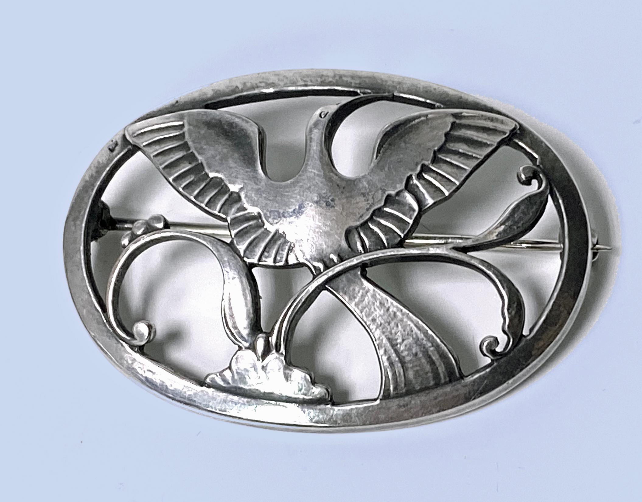 Georg Jensen Sterling Silver Bird of Paradise Brooch #238, designed by Arno Malinowski for Georg Jensen. Measures: 1.75 inches Weight 10.33 grams. Full Georg Jensen marks to reverse and design number 238