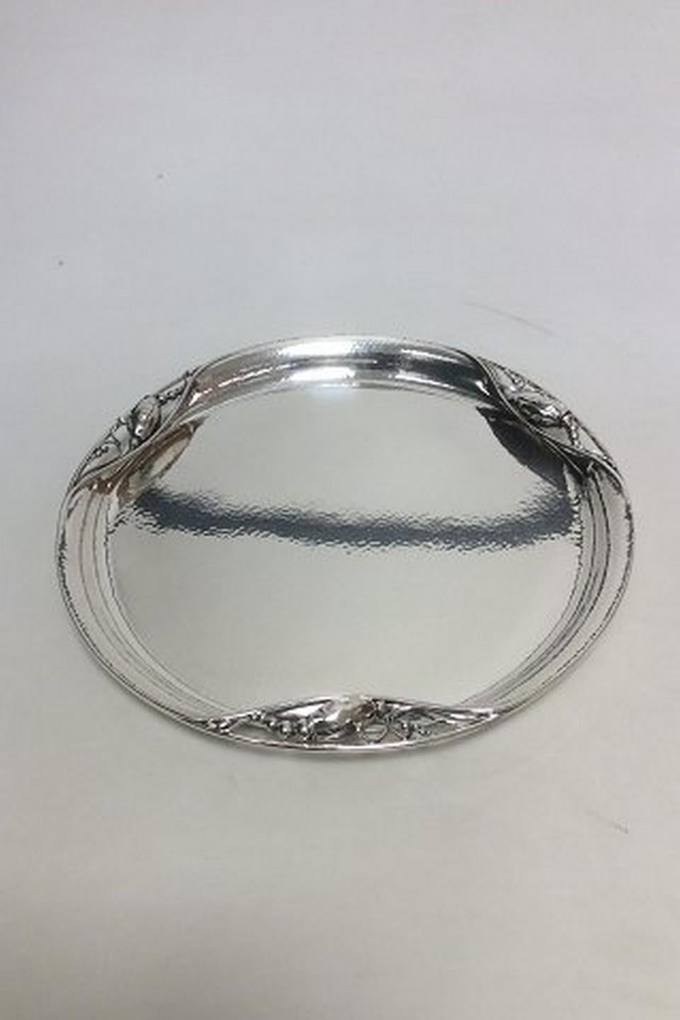 Georg Jensen sterling silver blossom cocktail tray 2 AF.

Fantastic condition with great hammering.

Measures: 30.5cm / 12
