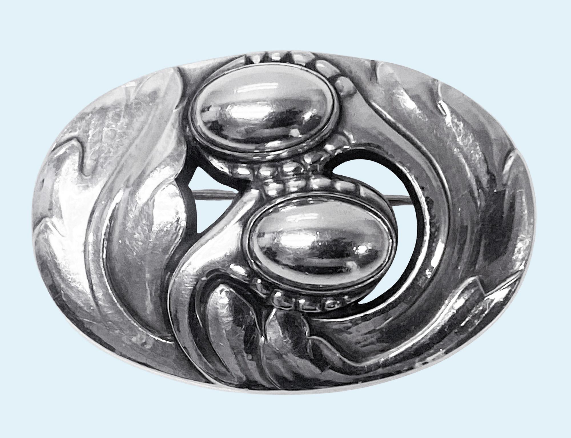 Georg Jensen Sterling Silver Blossom Pin C.1950 design No 7. Large and rare design stylised blossom floral pin brooch. Measures approximately 2.125 x 1.50 inches. Weight:20.81 grams. Full Georg Jensen Sterling Denmark oval dotted Georg Jensen design