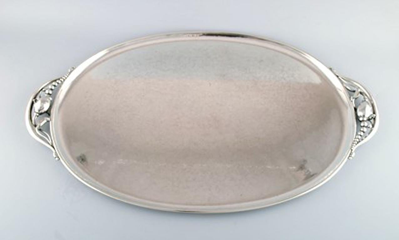 Georg Jensen sterling silver blossom very large and rare extra large serving tray number 2S.
Measures 64.5 cm x 40 cm.
In perfect condition.