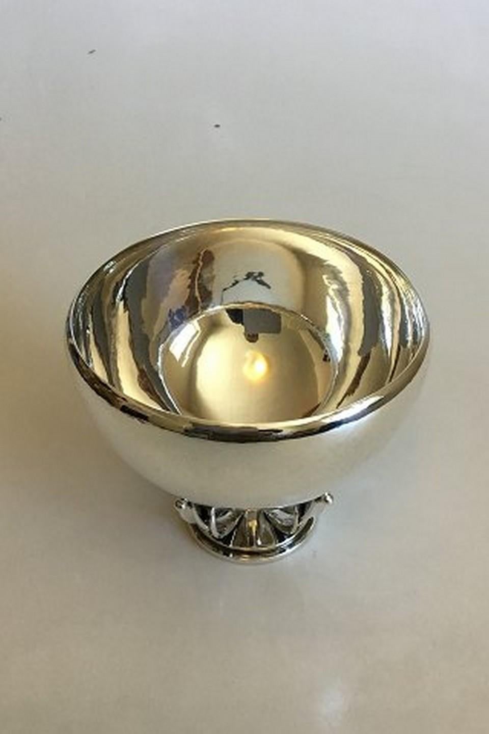 Georg Jensen sterling silver bowl no 665. 
Designed by Gustav Pedersen. Measures 11.5 cm / 4 17/32 in. x 13.8 cm / 5 7/16 in. diameter. 
Weighs 357 g / 12.60 oz.
Item no.: 337892.