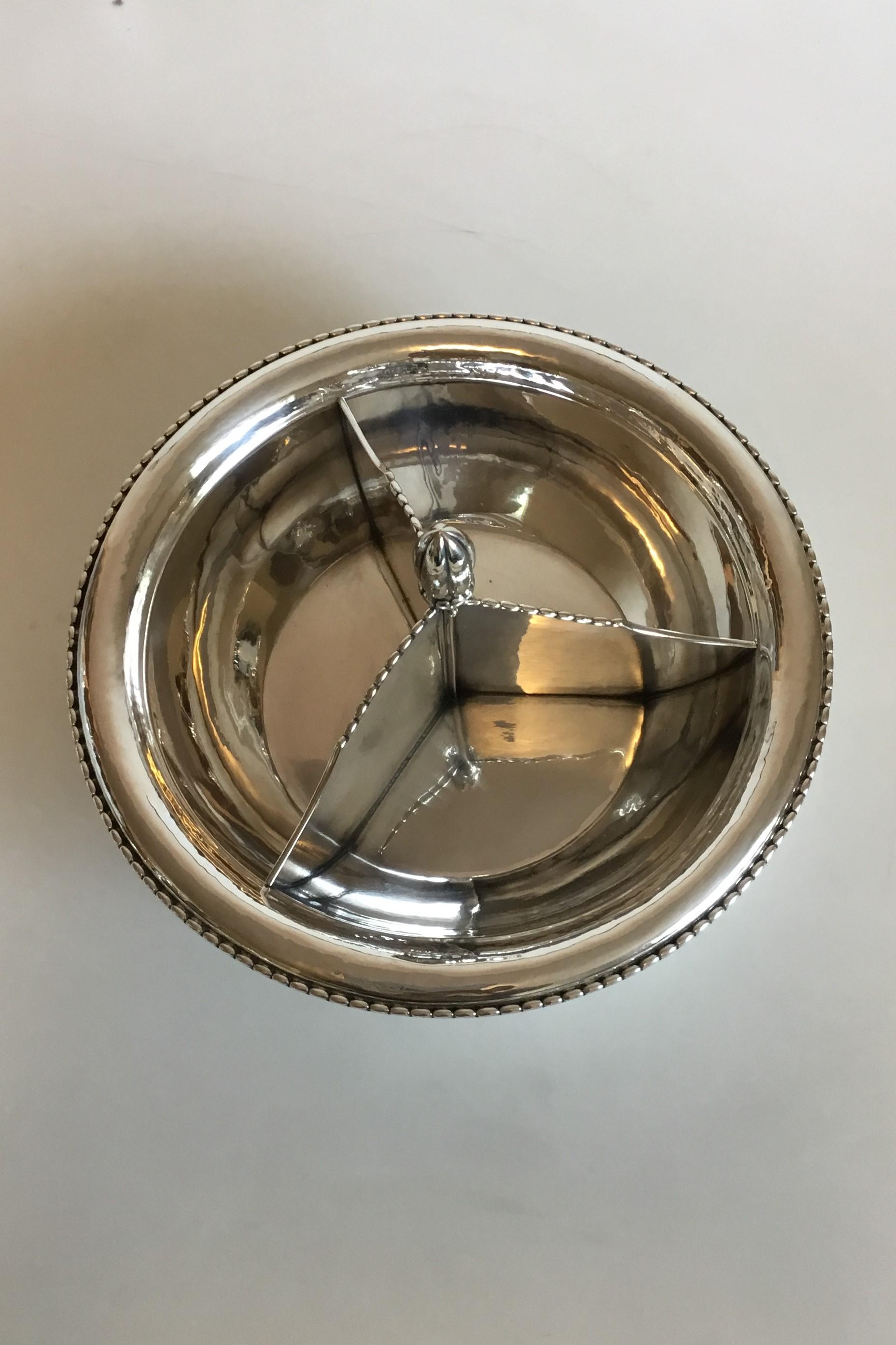 Georg Jensen sterling silver bowl with non-removable three divider No 290. Measures 12 cm / 4 23/32 in. x 26 cm / 10 15/64 in. dia. Weighs 782 g / 27.60 oz. From 1922-1933.