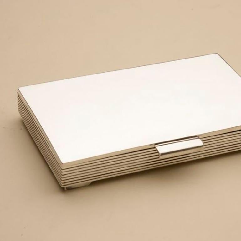 Georg Jensen sterling silver box by Sigvard Bernadotte No.712

Designer: Sigvard Bernadotte
Maker: Georg Jensen
Design #: 712
circa 1945
Dimensions: 5.25” L x 3.13” D x. .75” H
Country of Origin: Denmark

Bio about the designer Sigvard