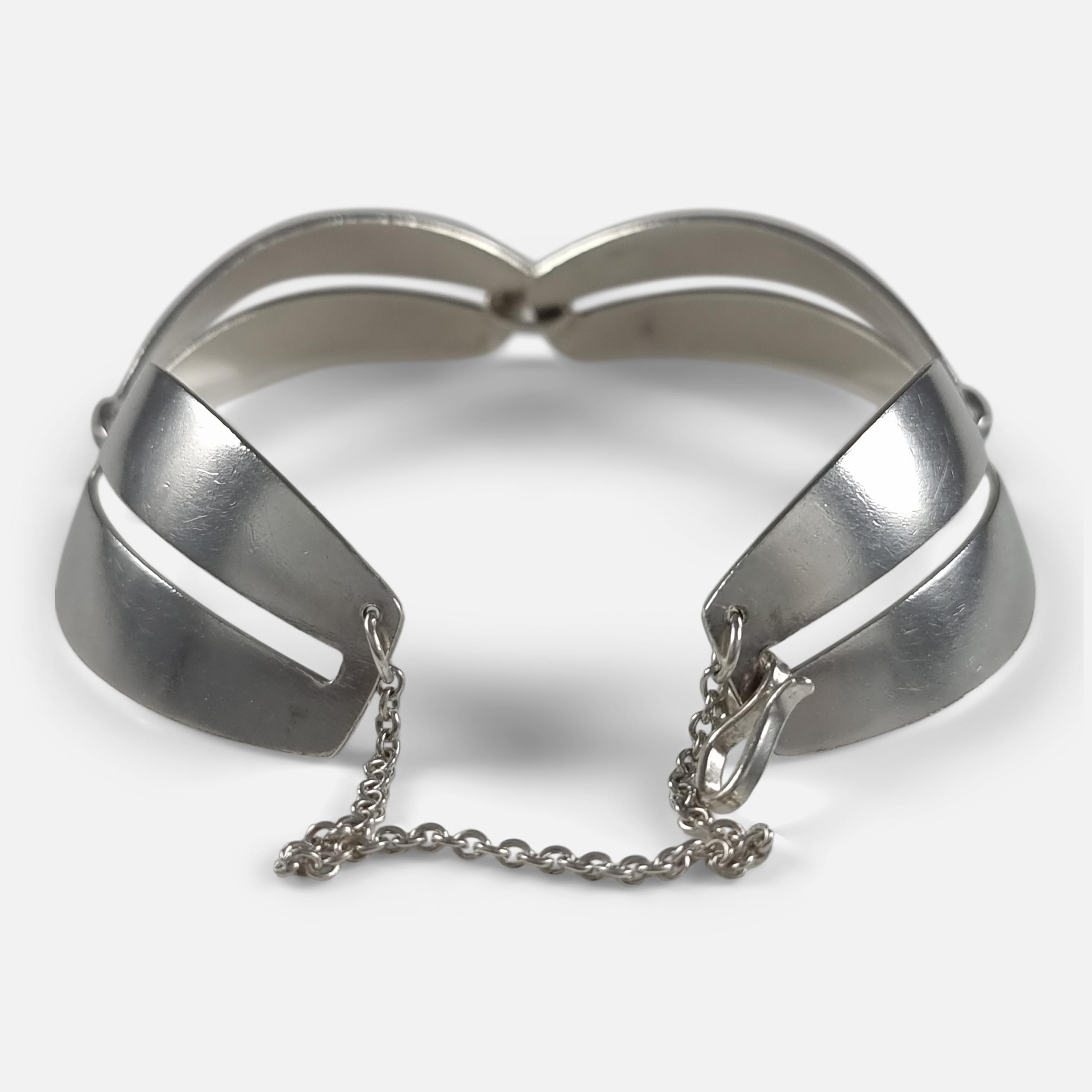 A sterling silver bracelet #170, designed by Nanna Ditzel for Georg Jensen.

Stamped with post-1945 Georg Jensen marks, '925S Denmark', '170', and with London import marks for 1967.

Period: - Late 20th century.

Engraving: - None.

Measurement: -