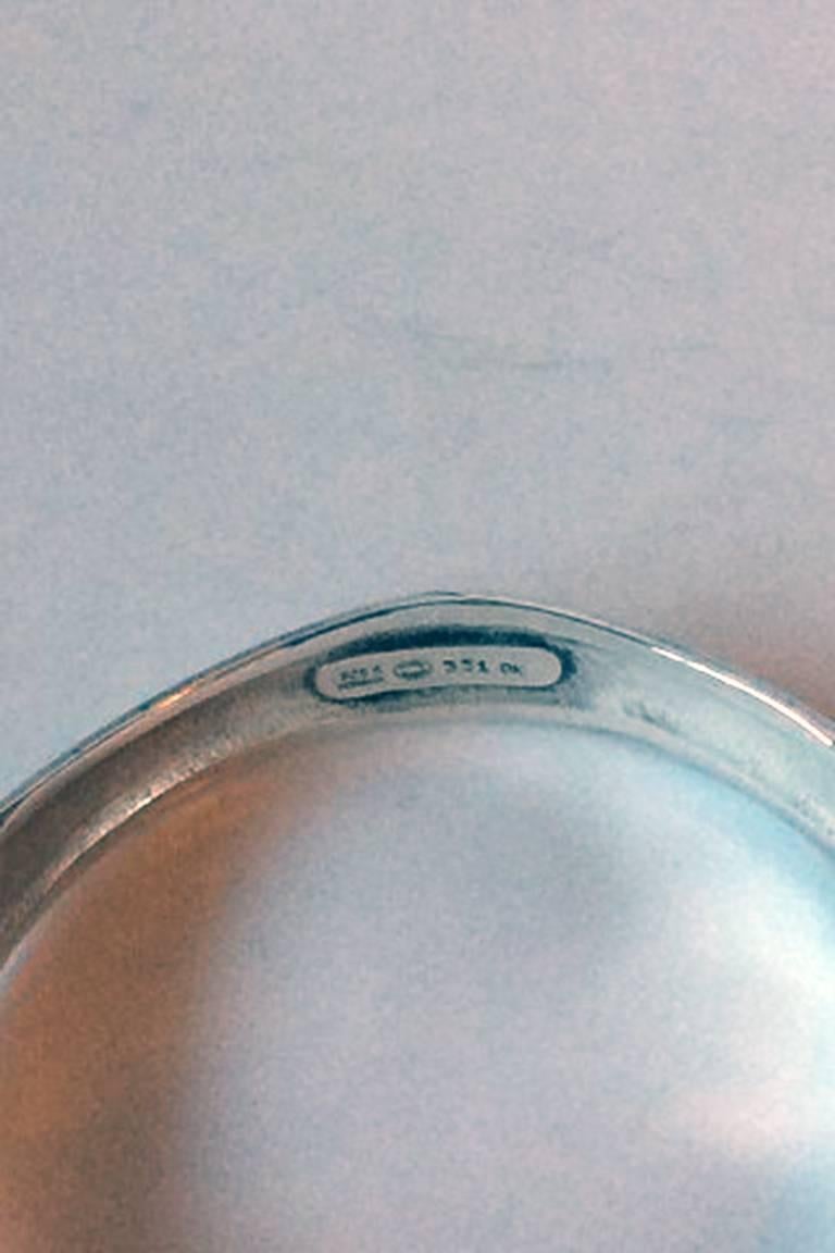 Georg Jensen Sterling Silver Bracelet by Ole Kortzau #331. Measures 6.9 cm / 2 7/10 in. inner diameter. Which is quite large. Weighs 32 grams / 1.15 oz.