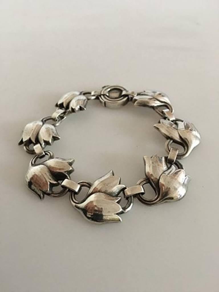 Georg Jensen Sterling Silver Bracelet No 100B. Measures 18 cm / 7 3/32 in. x 2 cm / 0 25/32 in. wide. Weighs 23 g / 0.80 oz. Manufactured after 1945 and is in great condition.