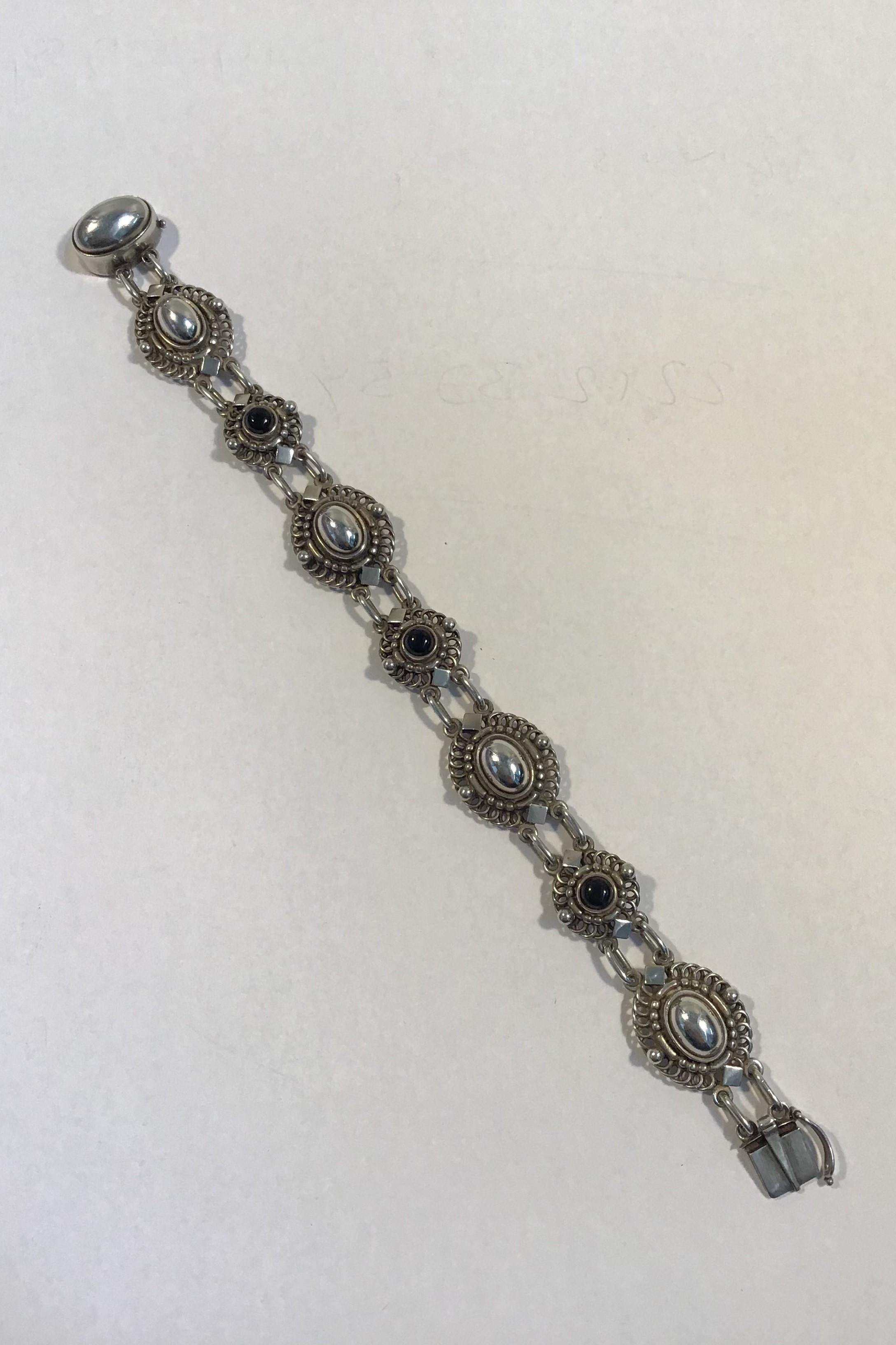 Georg Jensen Sterling Silver Bracelet No 419 (Black Onyx) 

Measures 19.5 cm(7 43/64 in) 
Weight 36.1 gr/ 1.7 oz