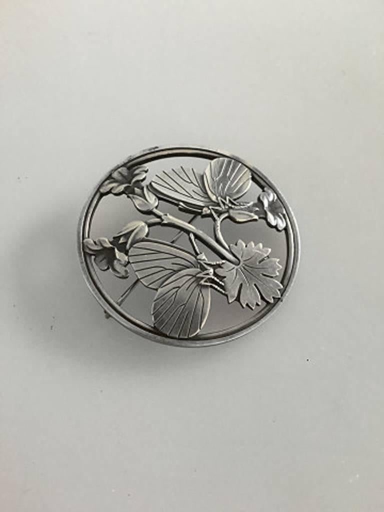 Georg Jensen Sterling Silver Brooch #283 with Butterfly Motif. Measures 5.5 cm dia.
Weighs 26 g / 0.9 oz
