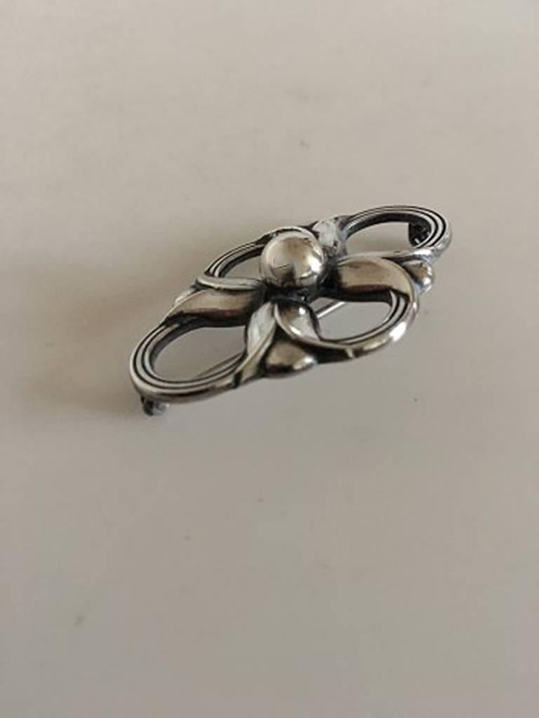 Georg Jensen Sterling Silver Brooch #305. Measures 4.2 cm L (1 21/32 in.). Weighs 6 grams (0.20 oz). From after 1945.