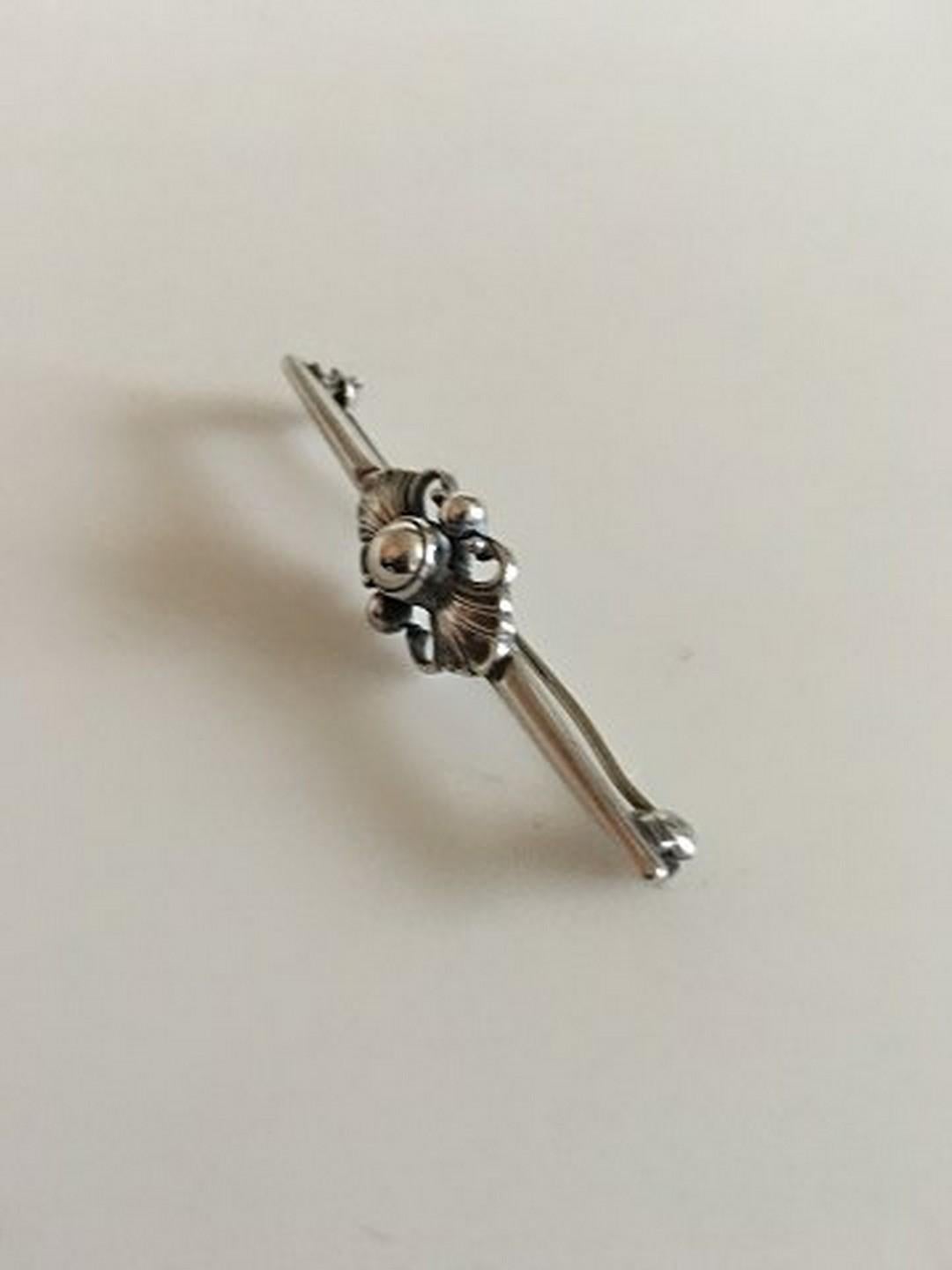 Georg Jensen Sterling Silver Brooch No 214. Measures 5.5 cm / 2 11/64 in. Weighs 6 g / 0.20 oz. From 1932-1944.