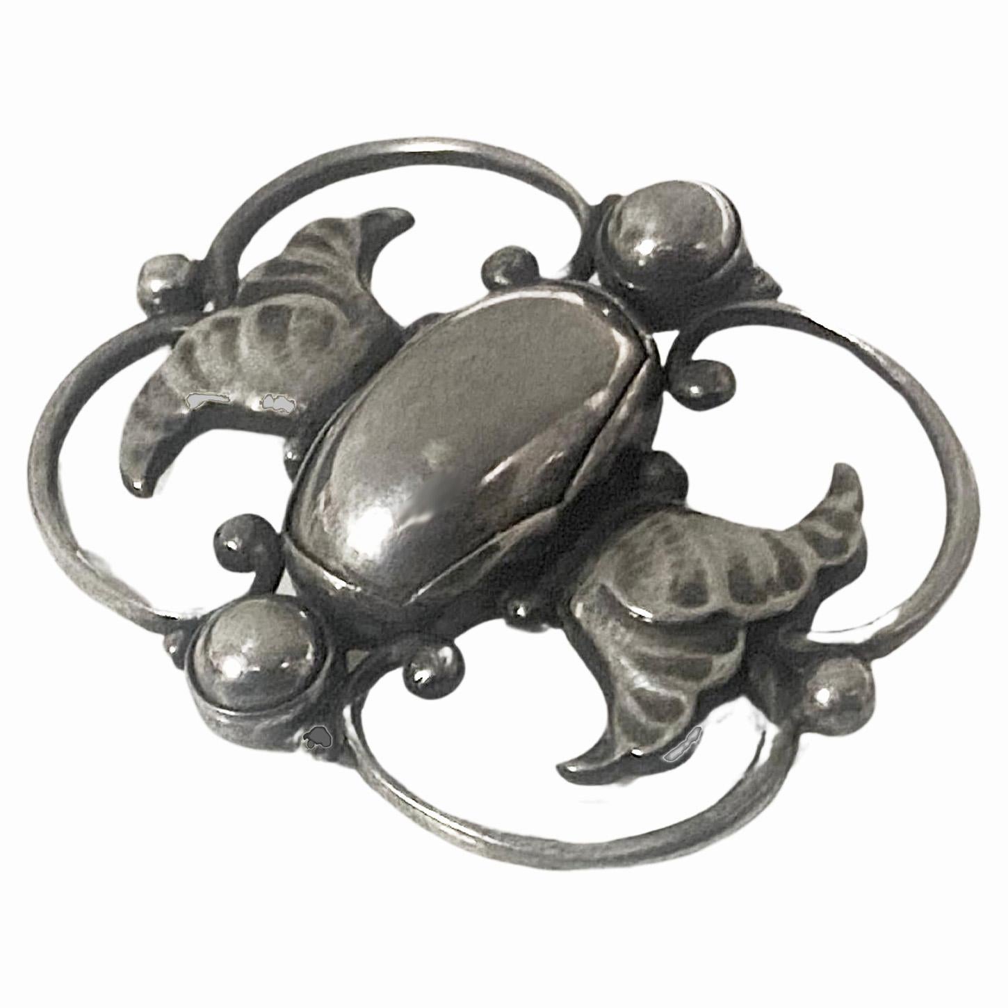 Georg Jensen Sterling Silver Brooch No. 236B. This is the rarer 23bB model tulip design Brooch. Full Georg Jensen marks post 1945 and numbered to the reverse. Measures: 4.13 x 3.33 cm. Weight: 10.92 grams. Condition: Good