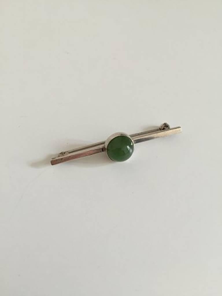 Georg Jensen Sterling Silver Brooch with Green Stone.  Measures 5.3 cm / 2 3/32 in. Weighs 5 g / 0.18 oz.