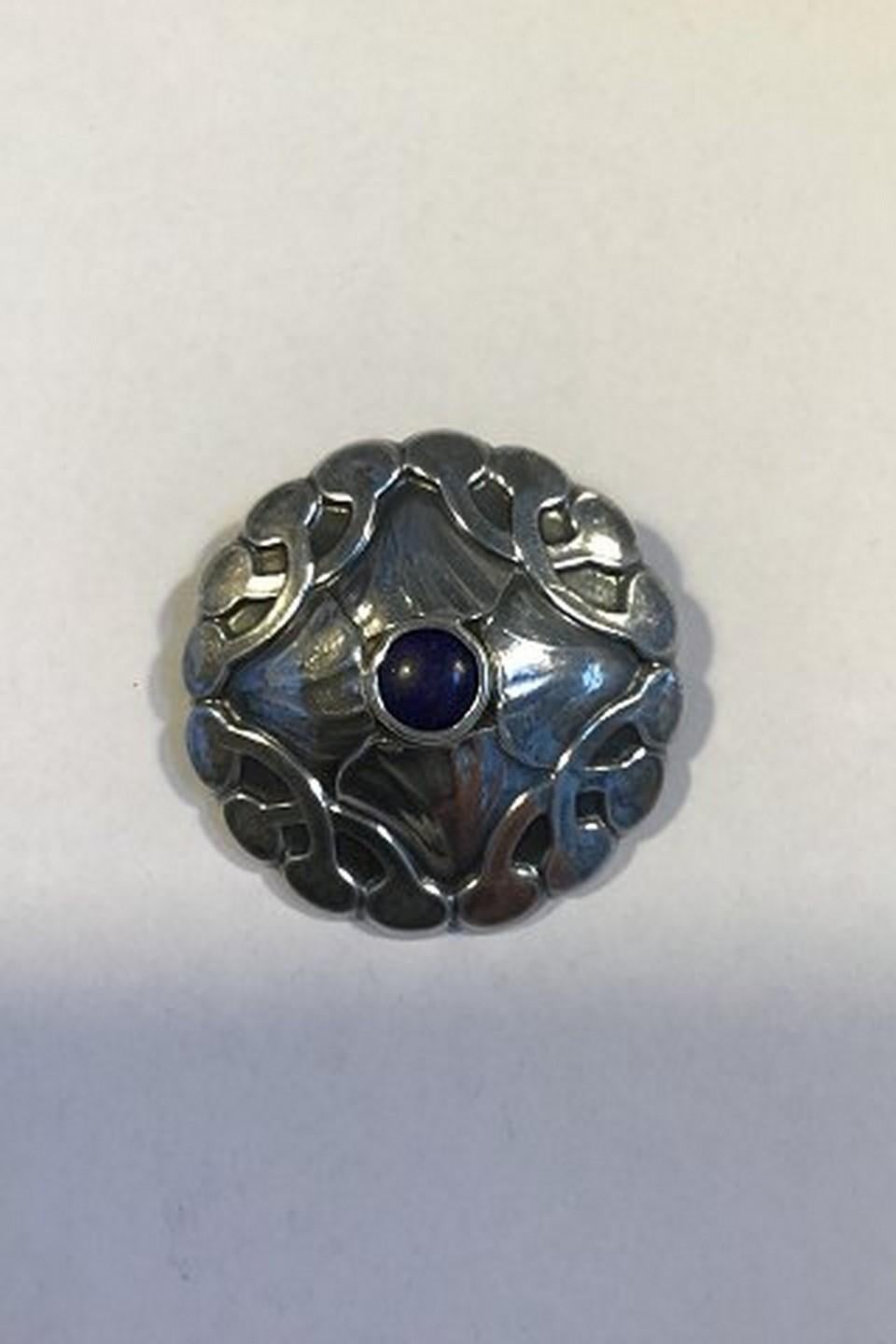 Georg Jensen Sterling Silver Brooch with Lapis Lazuli No 16 Diam 4.2 cm(1.65 in) Weight 14.4 gr 0.50 oz (Hallmarked for silver content and Design No, but NOT manufacturor as Georg Jensen, as it has been worn off)