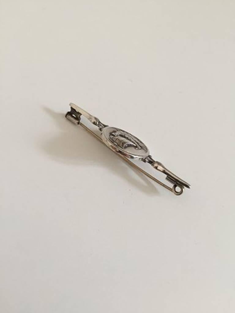 Georg Jensen Sterling Silver Brooch with Viking Ship #220. Measures 5,8cm (2 9/32 in.) and is in perfect condition. Weighs 8g / 0,30oz