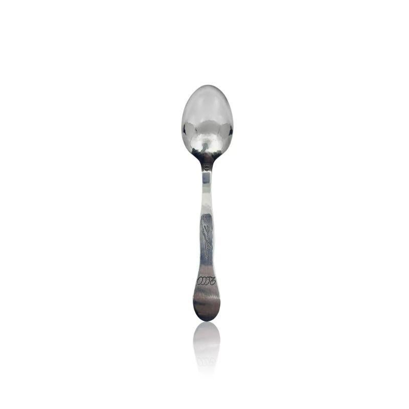 A Georg Jensen sterling silver 2000 Millennium spoon, with two set moonstones. New in the box along with the original brochure. This spoon was handcrafted in Denmark in 1999 and has a great deal of hand chasing.

Additional information:
Material: