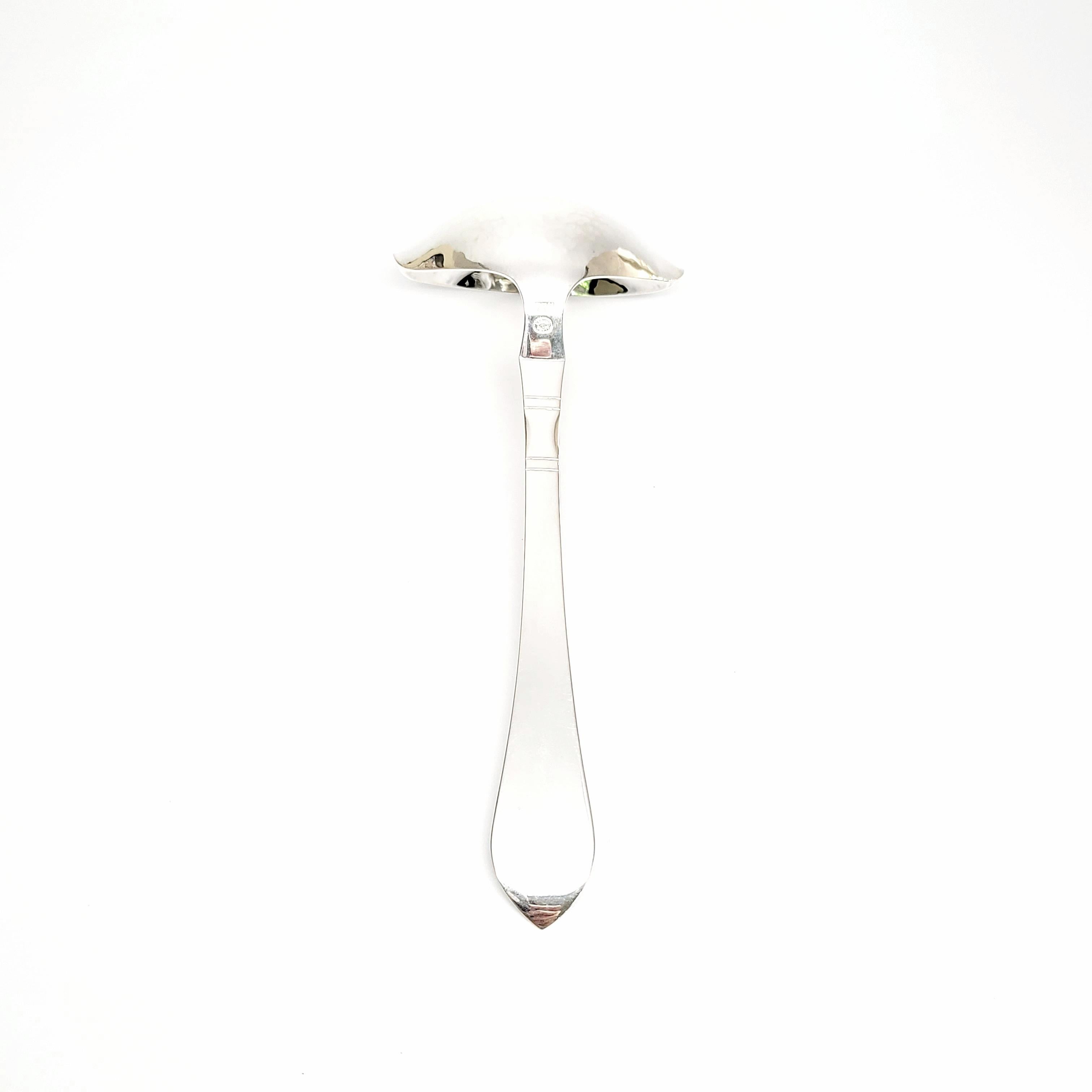 Georg Jensen Denmark sterling silver ladle in the Continental pattern.

The Continental pattern was designed in 1906 as the first major cutlery line from Georg Jensen. The pattern was inspired by traditional Nordic tools. This beautiful ladle is