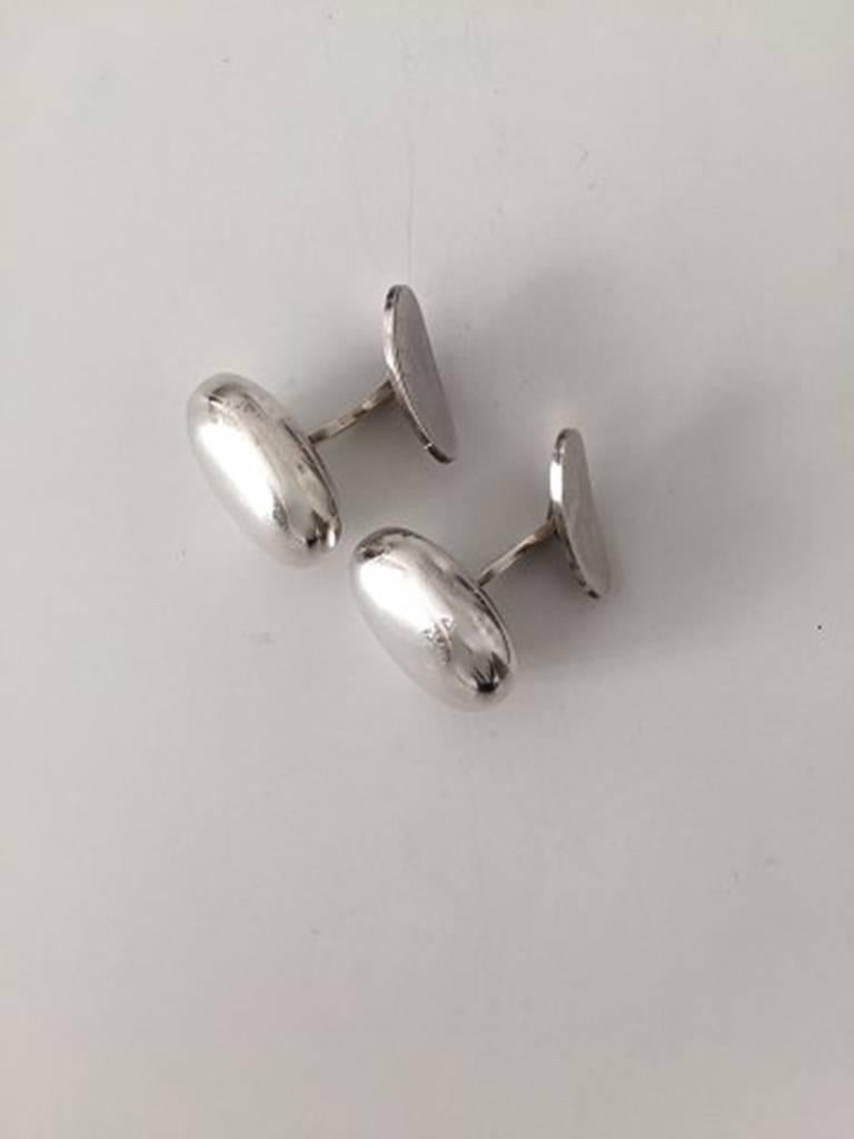 
Georg Jensen Sterling Silver Cuff Links by Torun No 120. Measures 2.3 cm / 0 29/32 in. and is in good condition. Weighs 16.6 g / 0.58 oz.