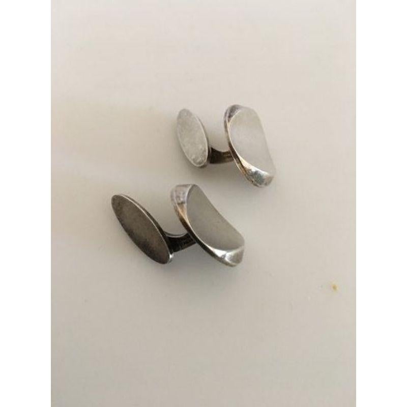 Georg Jensen Sterling Silver Cufflinks No 107. 

Measures 2 cm / 0 25/32 in. dia. Combined weight of 17.2 g / 0.61 oz.