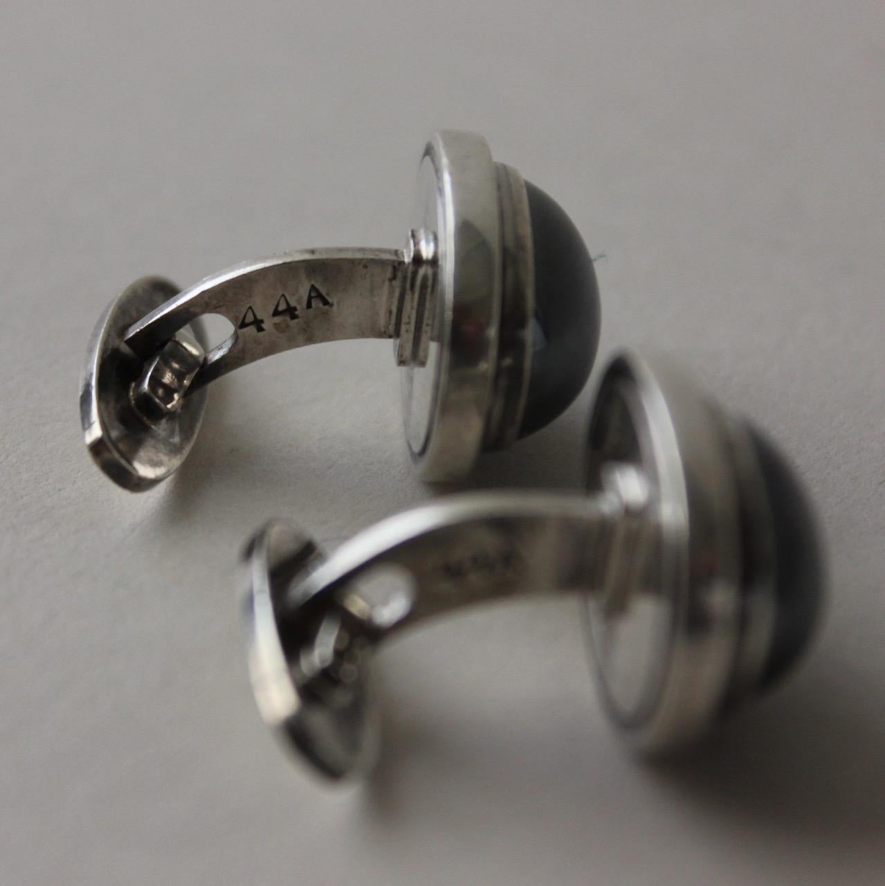 Georg Jensen Sterling Silver Cufflinks No 44A With Hematite.

Excellent Vintage condition.

 Designer: Harald Nielsen
 Maker: Georg Jensen
 Design #: 44A
 Circa: 1980s
 Dimensions: 0.75” X 0.63”
 Country of Origin: Denmark