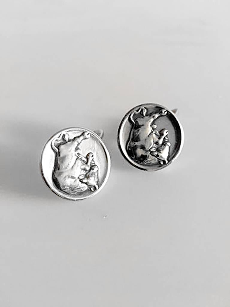 Georg Jensen Sterling Silver Cufflinks No 70 with Bull. From 1932-1945. Measures 2 cm / 0 25/32 in. diameter. Combined weight of 17 g / 0.60 oz.