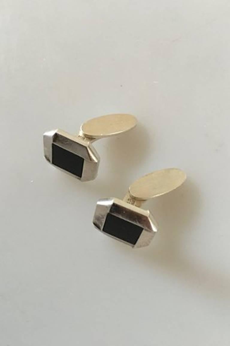 Georg Jensen Sterling Silver Cuff Links with Black Onyx No 202. 
Measures 1.5 / 0 19/32 in. x 1.5 cm / 0 19/32 in.