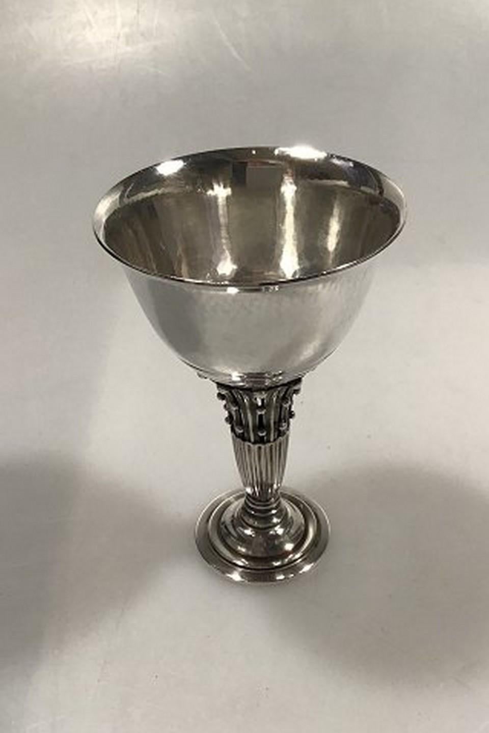 Georg Jensen sterling silver cup on stem/goblet no. 309B. Measures: Height 10.5 cm (4 9/64 in), diameter 7.3 cm (2 7/8 in) weight ca 112 gr/3.90 oz
Item no.: 434574.