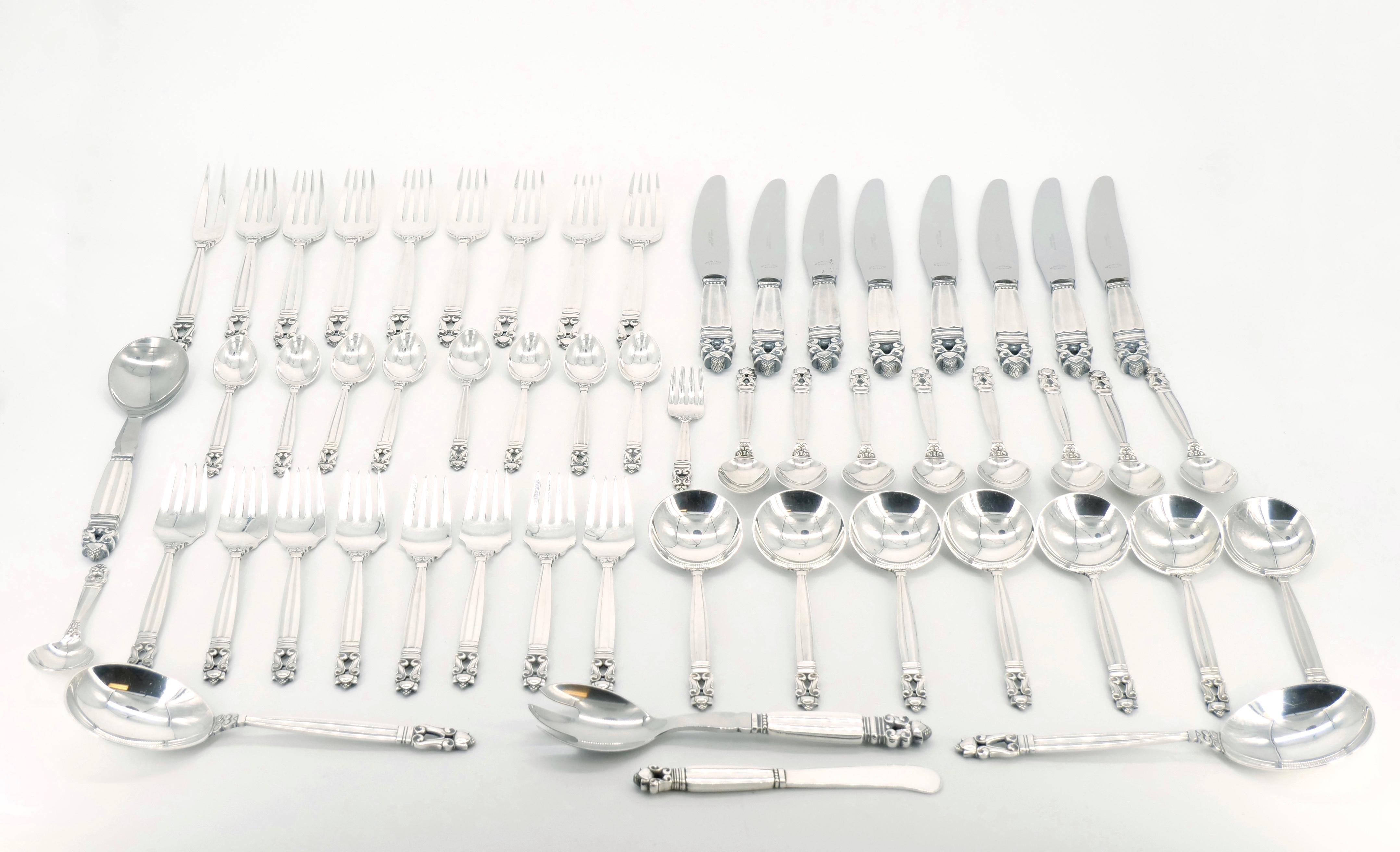 Discover timeless sophistication with this exquisite sterling silver flatware service designed in the iconic Acorn pattern by Georg Jensen. Produced circa 1917, this set boasts not only a rich history but also impeccable craftsmanship and enduring