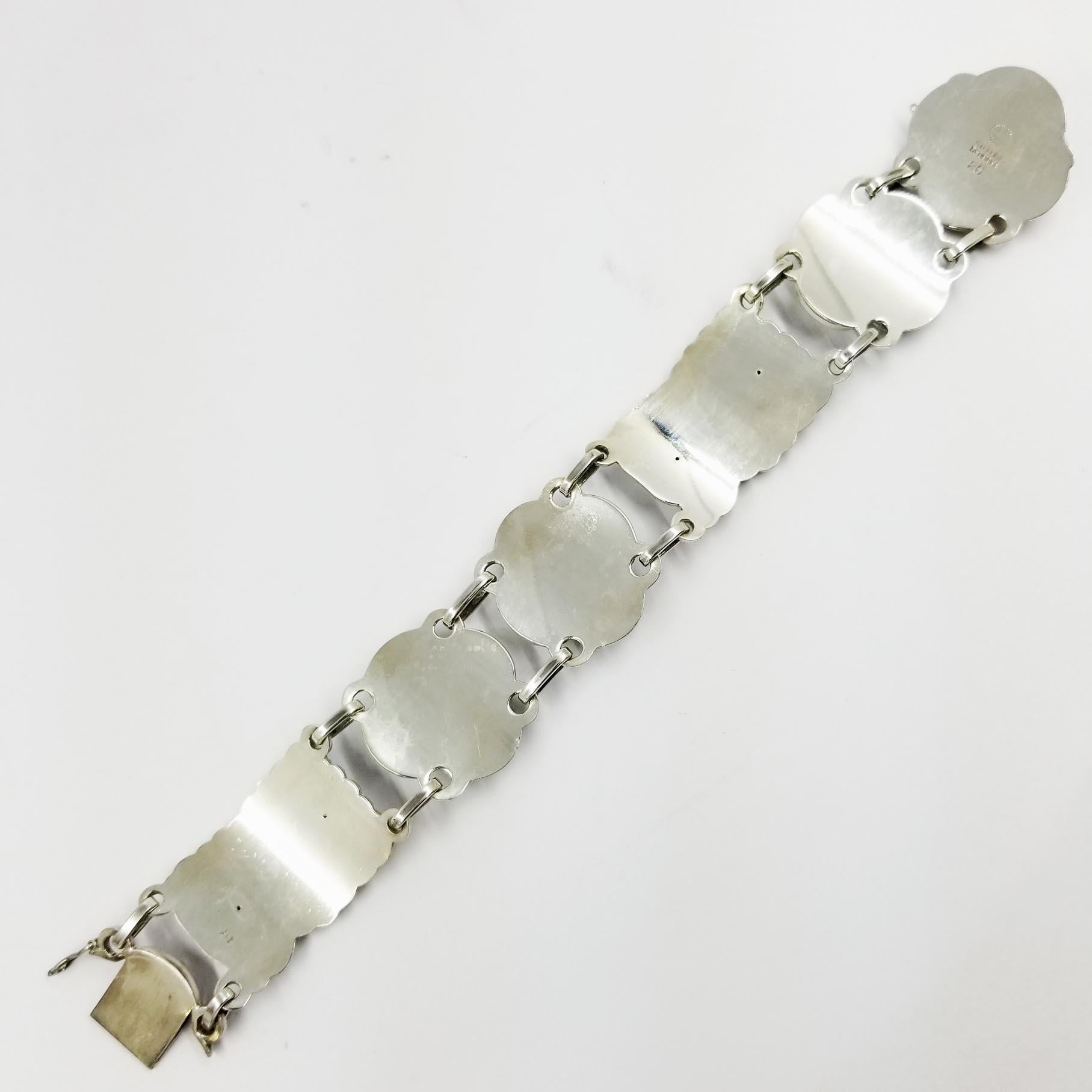 This rare all sterling silver bracelet is from designer Georg Jensen. The recently polished design is stamped on the back: 26 Sterling Denmark. Length is 7.25 inches. Hidden box clasp with figure 8 safety.