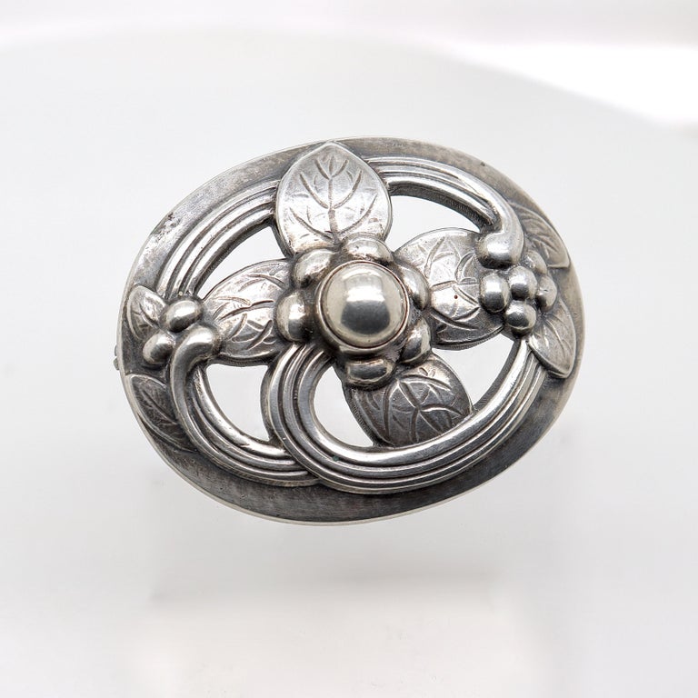 Jensen brooch store