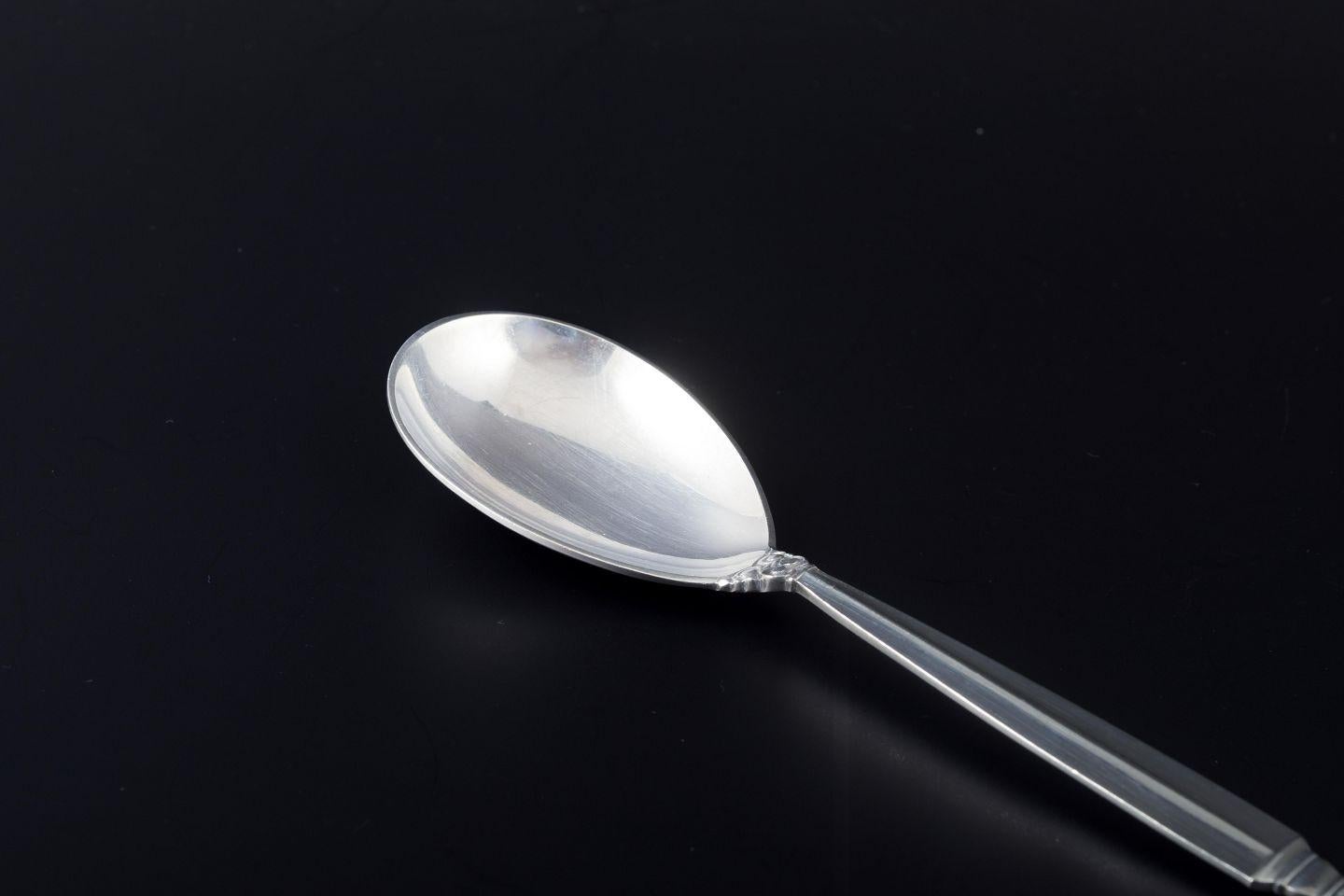 PRE-OWNED GOODS ARE EXEMPT FROM IMPORT TARIFFS FOR U.S., UK, AUSTRALIAN & CANADIAN CUSTOMERS.   
THEREFORE, NO IMPORT TARIFFS WILL BE APPLICABLE TO YOUR PURCHASE. 

Georg Jensen
Jam spoon in the “Acanthus” pattern.
Sterling silver.

Designer: Georg