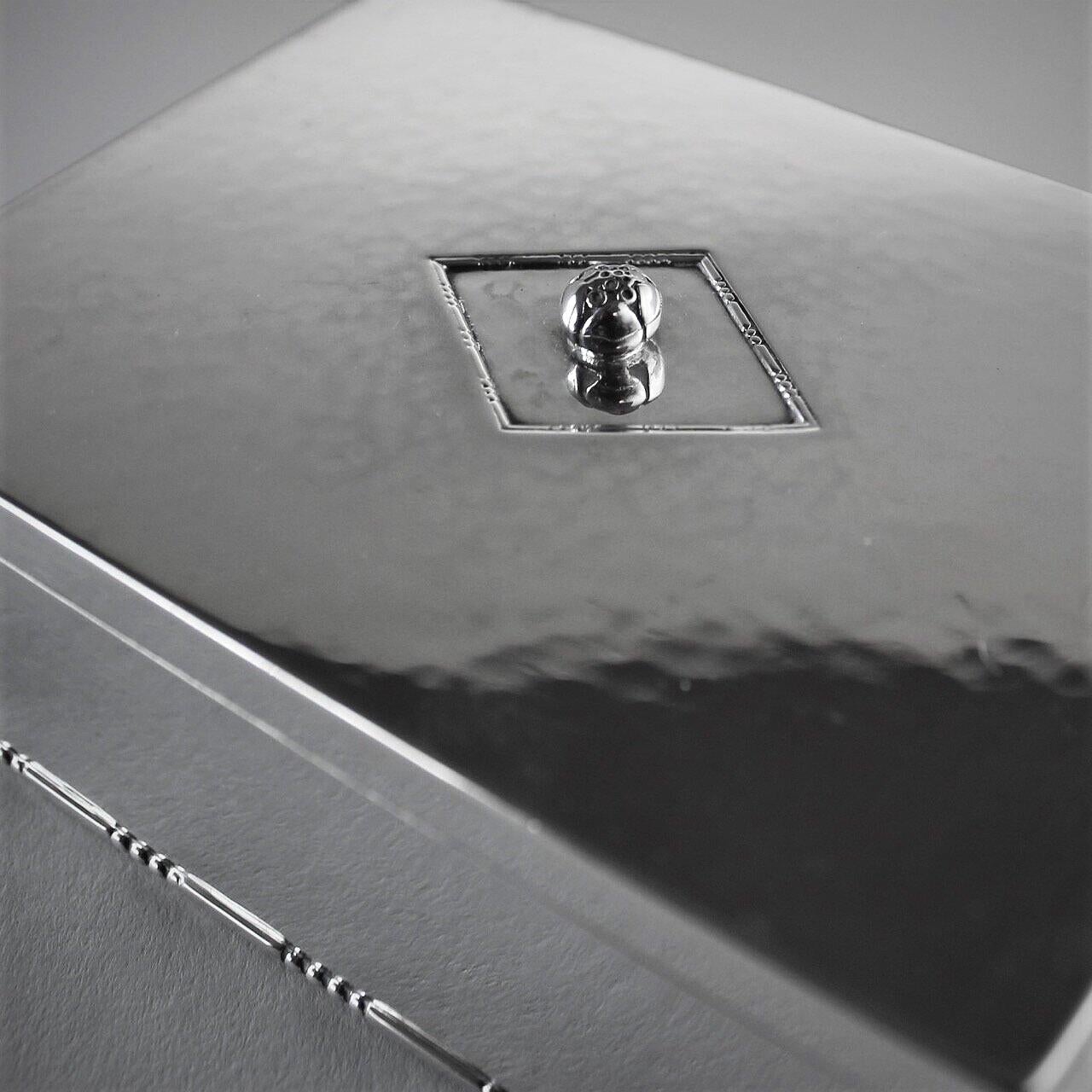 Georg Jensen sterling silver Keepsake box, No.329

A similar example can be seen in the book Georg Jensen HOLLOWARE, The Silver Fund collection by David Taylor and Jason Laskey, pg 233.

Designer: Georg Jensen
Maker: Georg Jensen
Design #: