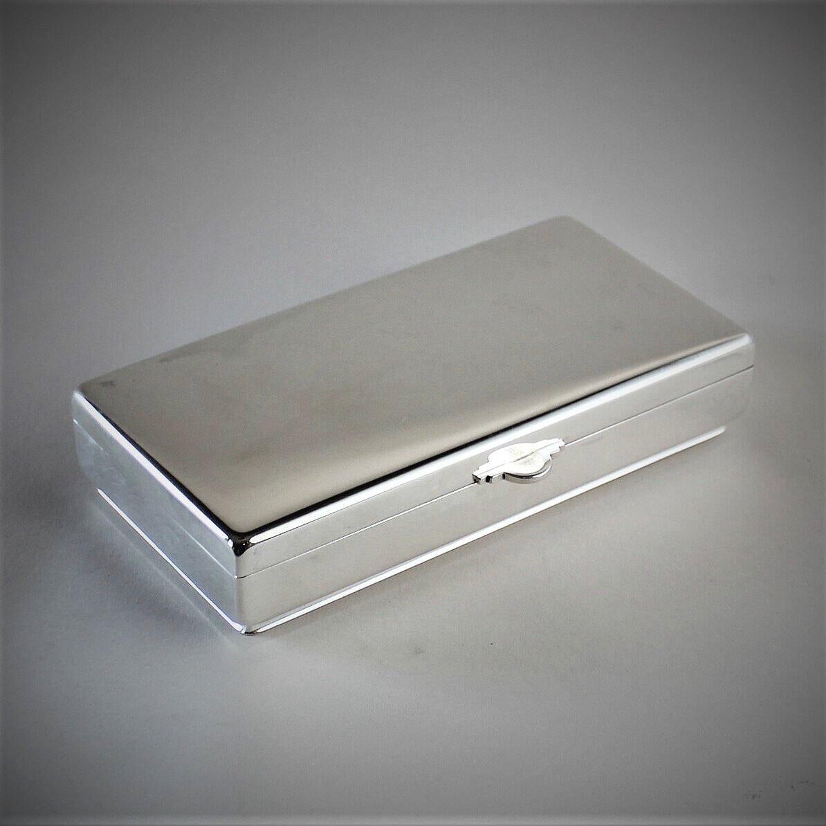 Georg Jensen sterling silver keepsake box, No.962 by Sören Georg Jensen

Heavy and modern.

A similar example can be seen in the book Georg Jensen Holloware, The Silver Fund collection by David Taylor and Jason Laskey, pg 291.

Designer: Sören
