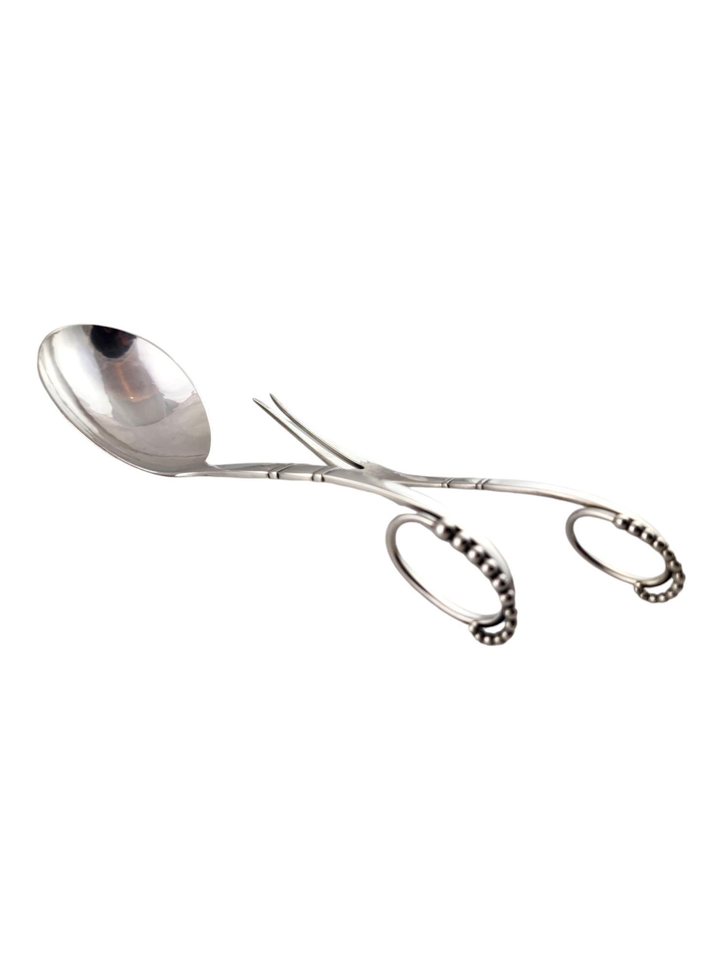 Georg Jensen Sterling Silver Ladle and Two Tine Serving Fork Ornament Pattern 41

This gorgeous Georg Jensen set includes a ladle and a serving two tine fork both meticulously crafted from sterling silver in the Ornament pattern 41!

Approximate